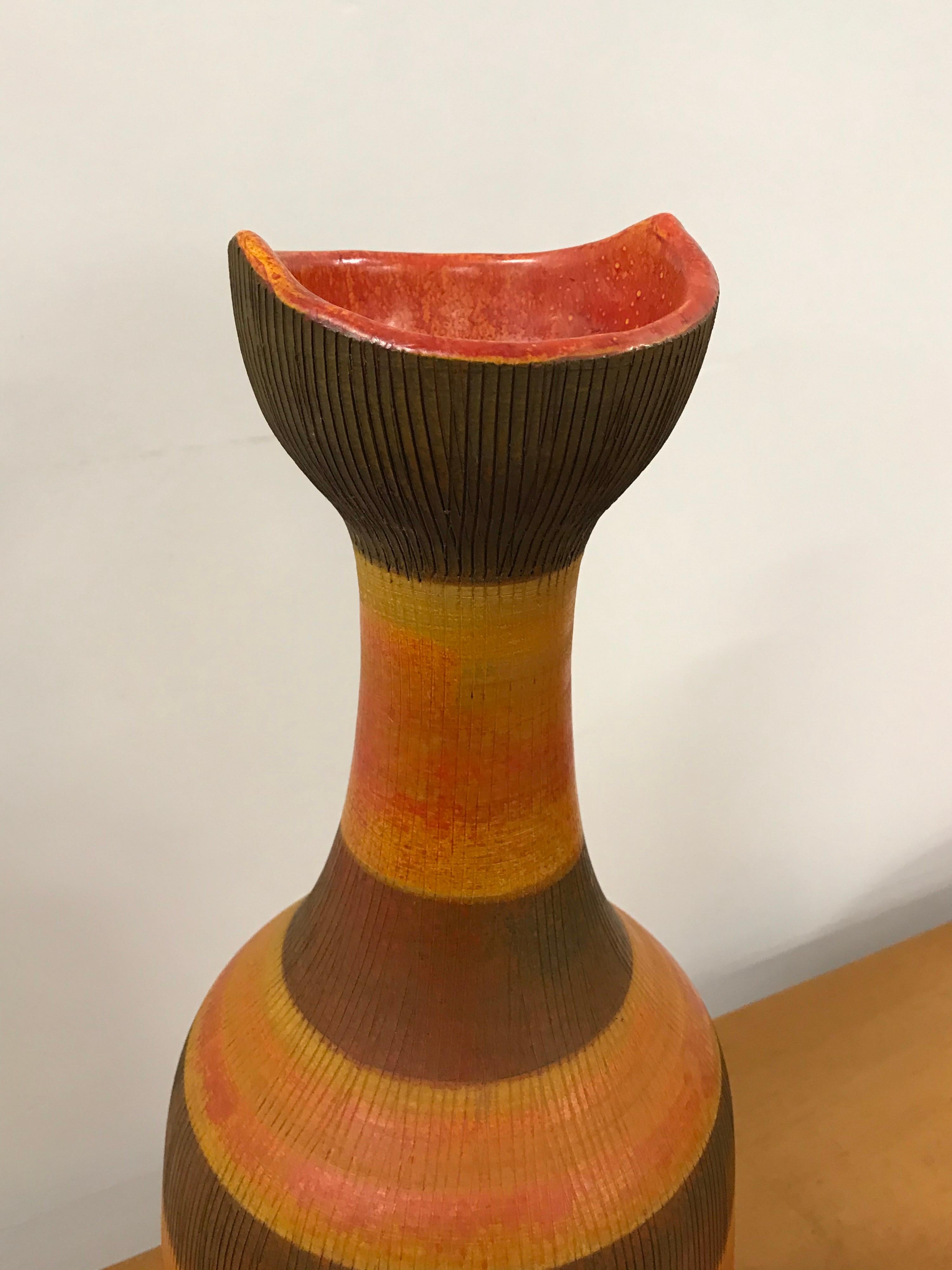 Exceptional and large floor vase designed by Aldo Londi for Bitossi. Rare and largest size of this shape. Stunning color and form. 
Measures: 20” tall 
7.5” wide.