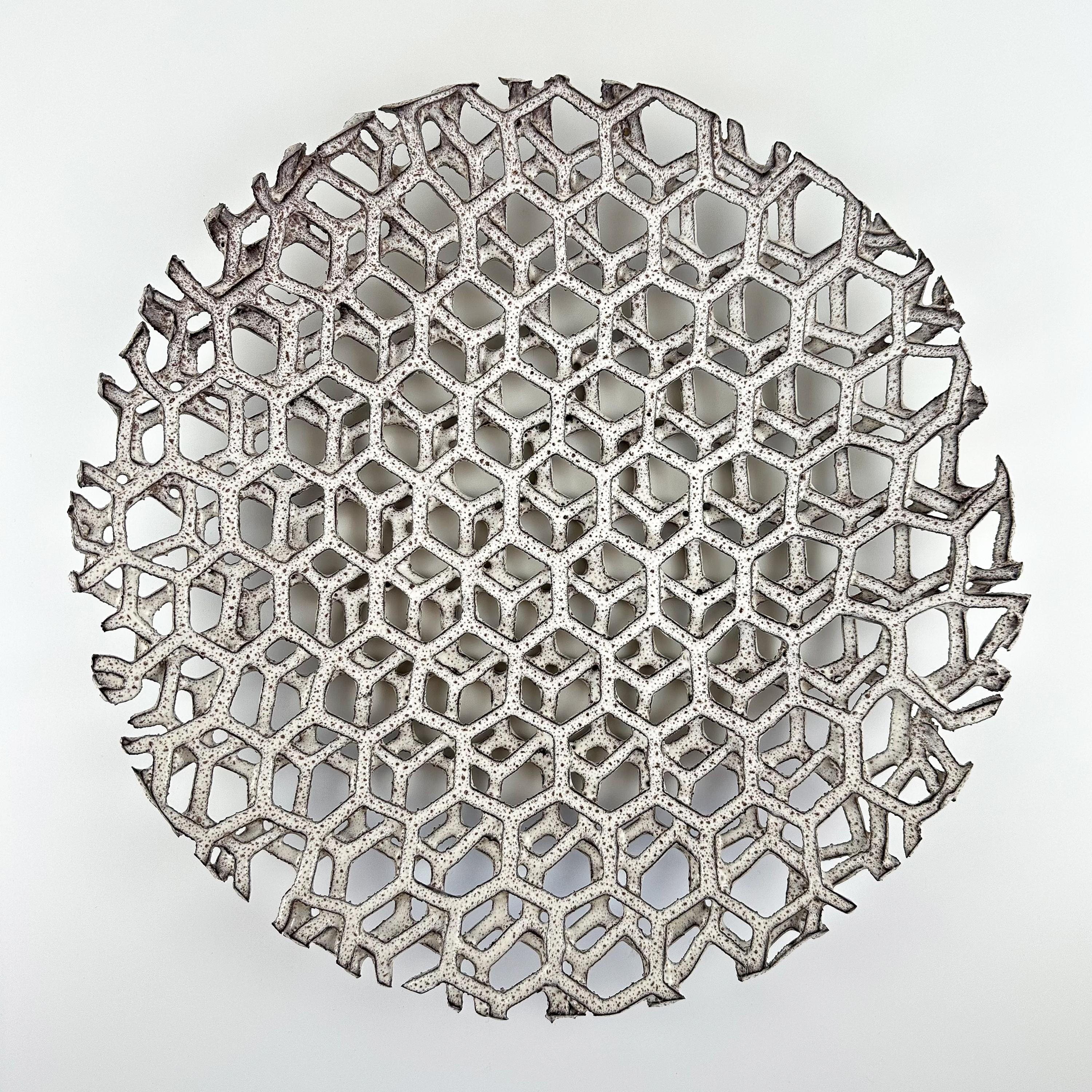 A very rare and uncommon Alessio Tasca (b. 1929) geometric layered ceramic centerpiece, Italy circa 1970s. This modern low centerpiece fruit bowl is comprised of 3 layers of ceramic lattice with a hexagon shape design. These delicate layers are