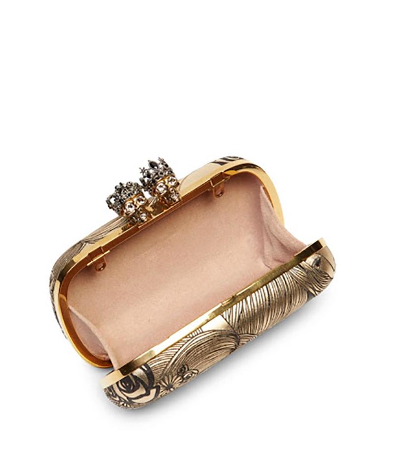 Rare ALEXANDER MCQUEEN Queen & King Leather Clutch

Printed leather clutch adorned with Swarovski crystals. 
Removable chain strap. 
Magnetic top closure.
6.25