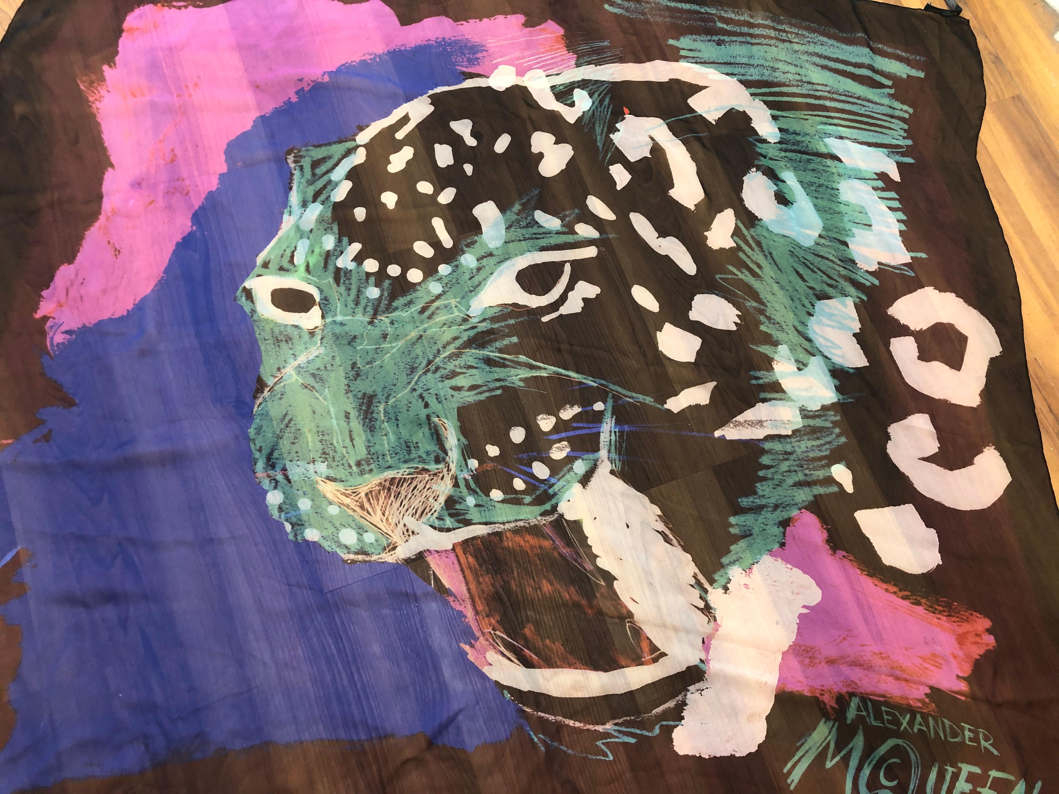 Gorgeous colorful oversized silk chiffon Alexander McQueen scarf featuring a huge leopard head surrounding by a mixed palette. Can be worn as a sarong, a shawl or in numerous ways as a scarf.