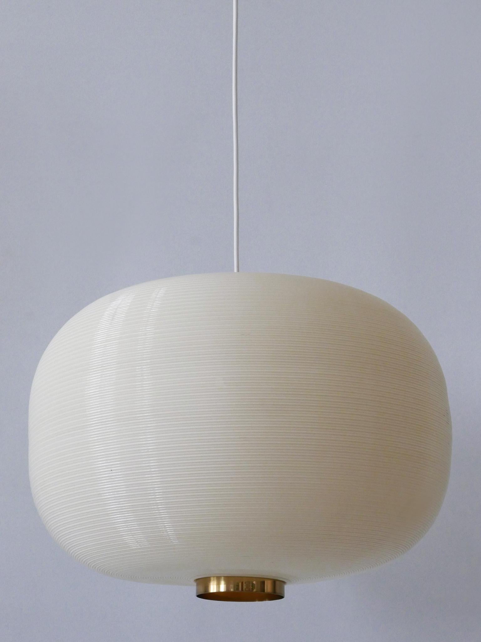 Extremely rare, elegant and highly decorative Mid-Century Modern Rotoflex pendant lamp or haning light. Model TR-67. Designed by Alf Svensson & Yngvar Sandström for Bergboms, Sweden, Malmö, 1960s

Executed in striped rotoflex and brass, the pendant