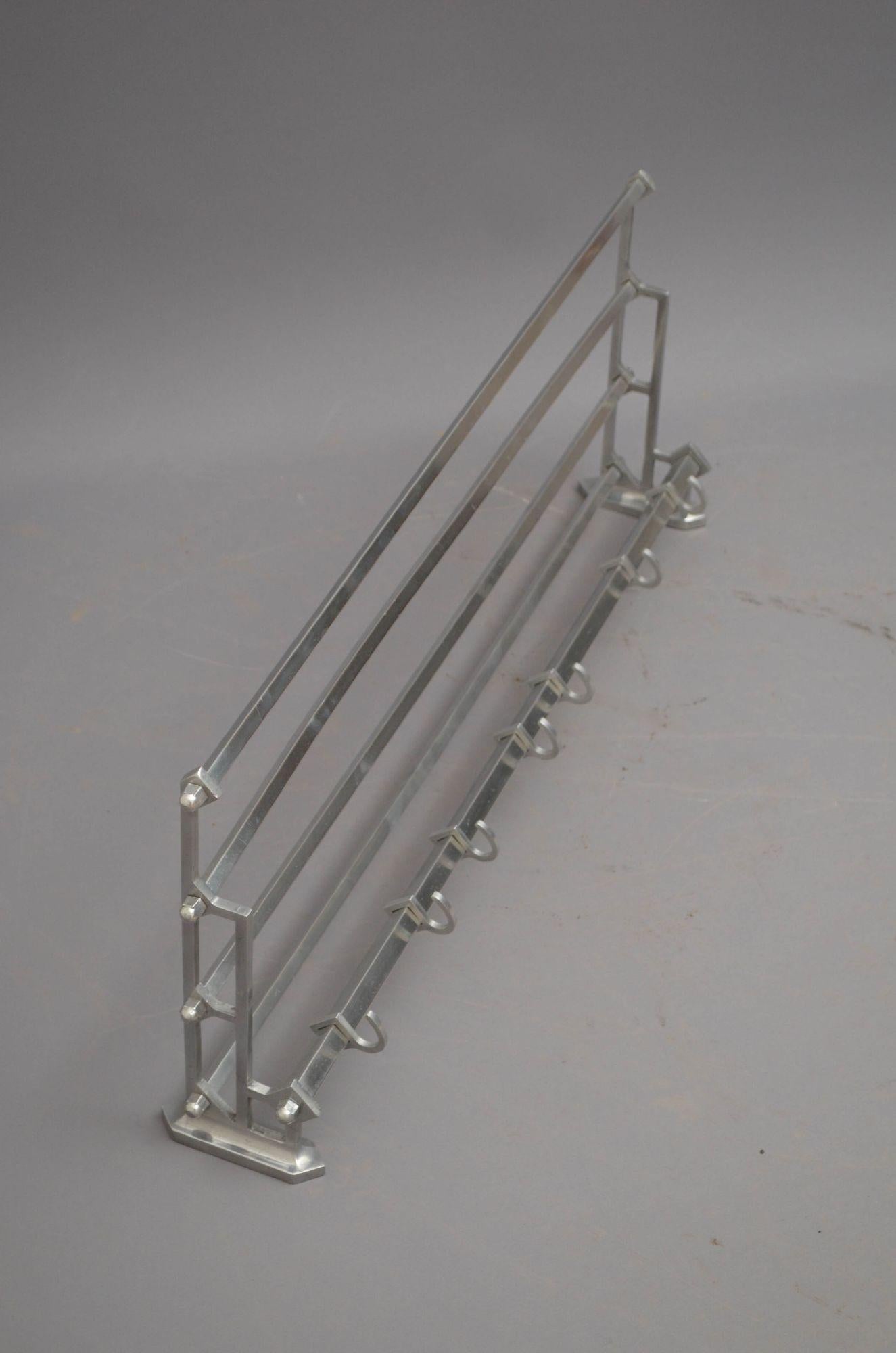 P0275 Stylish Bauhaus design, train style coat rack with a shelf, having seven adjustable hooks, four top shelf bars (with iron insets, making it very strong) and elegant stylized sides. This antique coat hook rack was cleaned and polished and is in