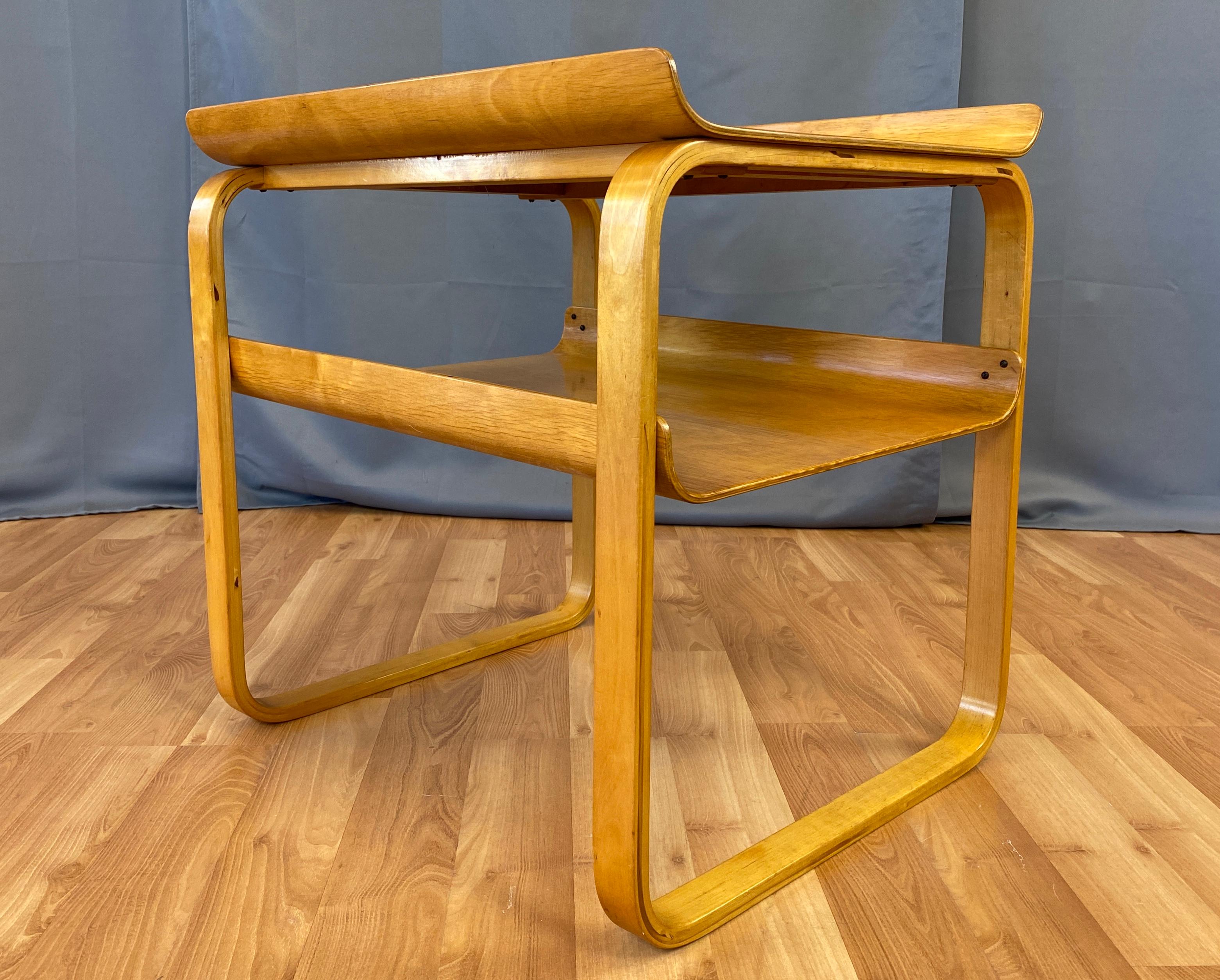 A late 1940s table by Alvar Aalto for O.Y. Huonekalu-ja Rakennustyötehdas A.B, Finland.
This two-tier occasional table, model no. 75, was designed for the Tuberculosis Sanatorium, Paimio Finland (which was also designed by Alvar