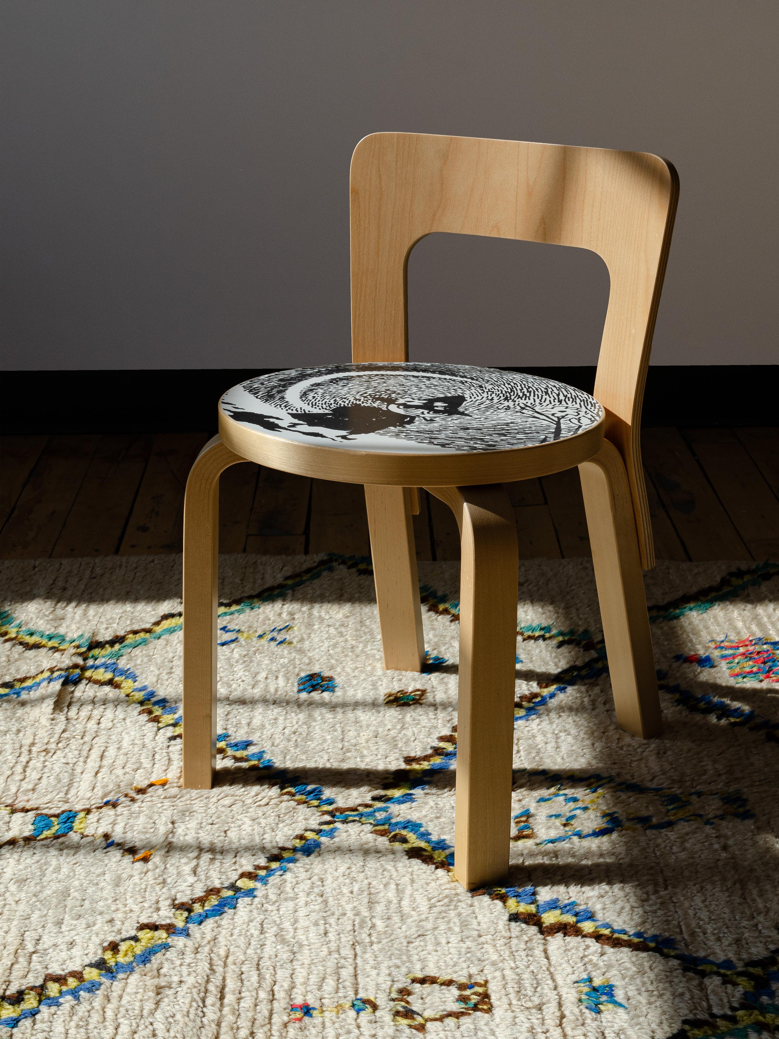 Artek's N65 children's chair is a slightly re-sized model of Chair 65 designed by Alvar Aalto in 1935. In 2013, in honor of the 80th anniversary, Artek released classic furniture decorated with beloved Moomin characters. The seat of the chair is