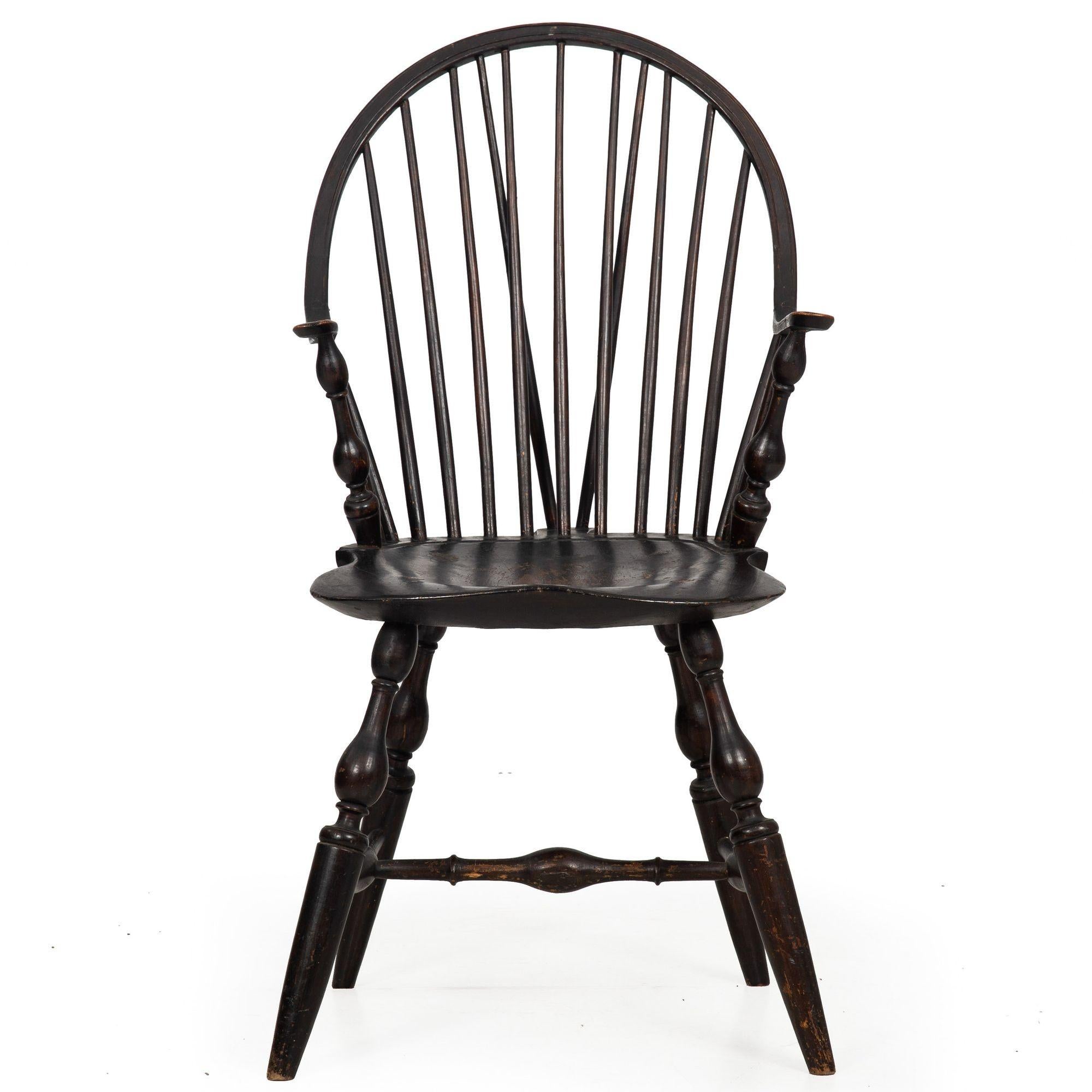 AMERICAN BRACE-BACK CONTINUOUS-ARM WINDSOR CHAIR
New York, ca. 1790  retaining an early nearly black painted surface
Item # 310LJI05P
A very fine continuous-arm windsor chair with a brace-back form, it retains an early and beautifully oxidized black