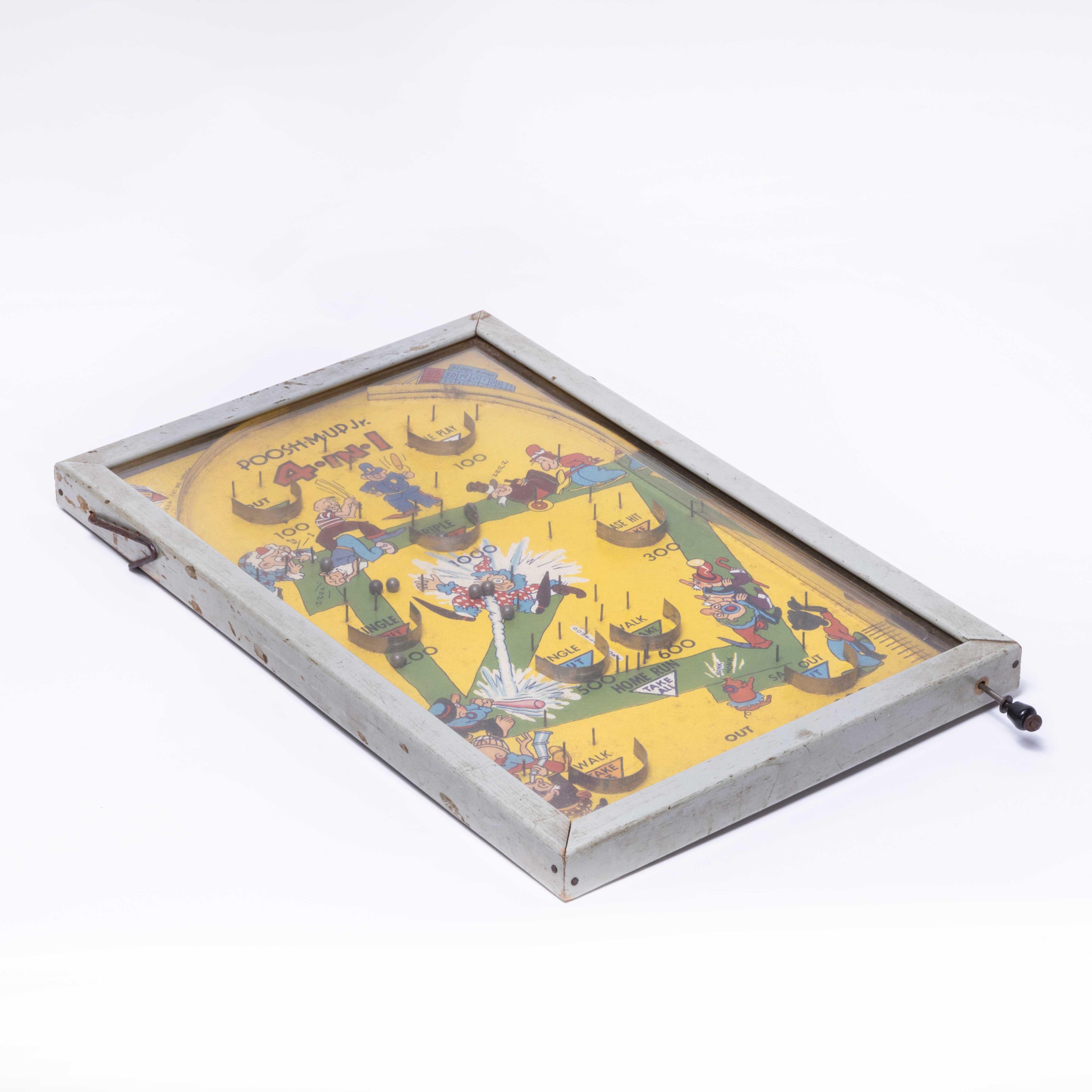 Rare American Mid Century Push Mud Jr Pinball Game - Bagatelle. 

Pinball game still in full working order. Made in America. Sold as a decorative item but in reasonable working order for a very old bagatelle game, game includes ten steel