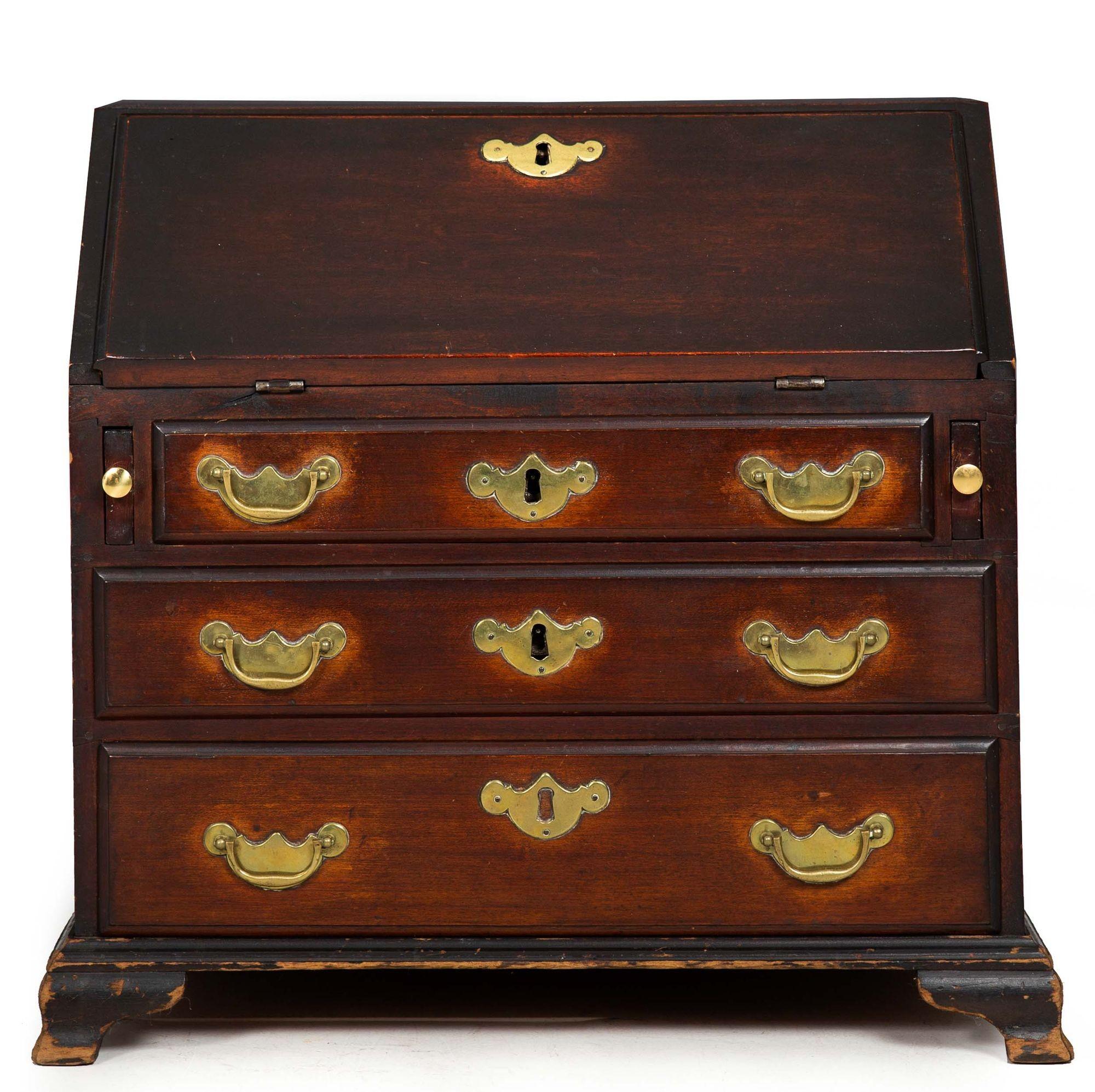 AMERICAN QUEEN ANNE MAHOGANIZED BIRCHWOOD CHILD'S SLANT-FRONT DESK
New England States, circa 1760  with mostly original hardware and an early surface
Item # 310HOT05Z
A rare and quite compelling bureau-top writing chest or also designed as a child's