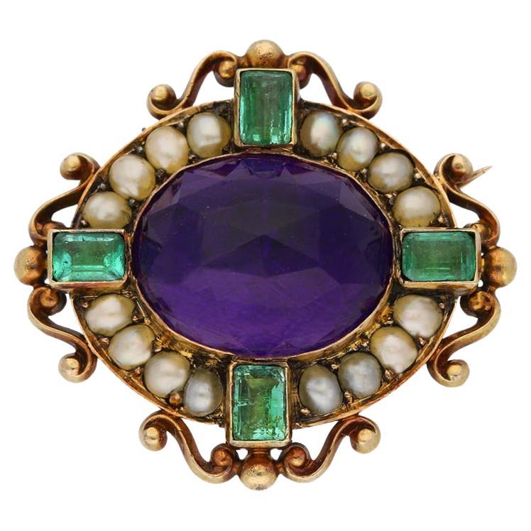 Rare amethyst, emerald and pearl brooch by Carlo Giuliano, English, circa 1890. For Sale