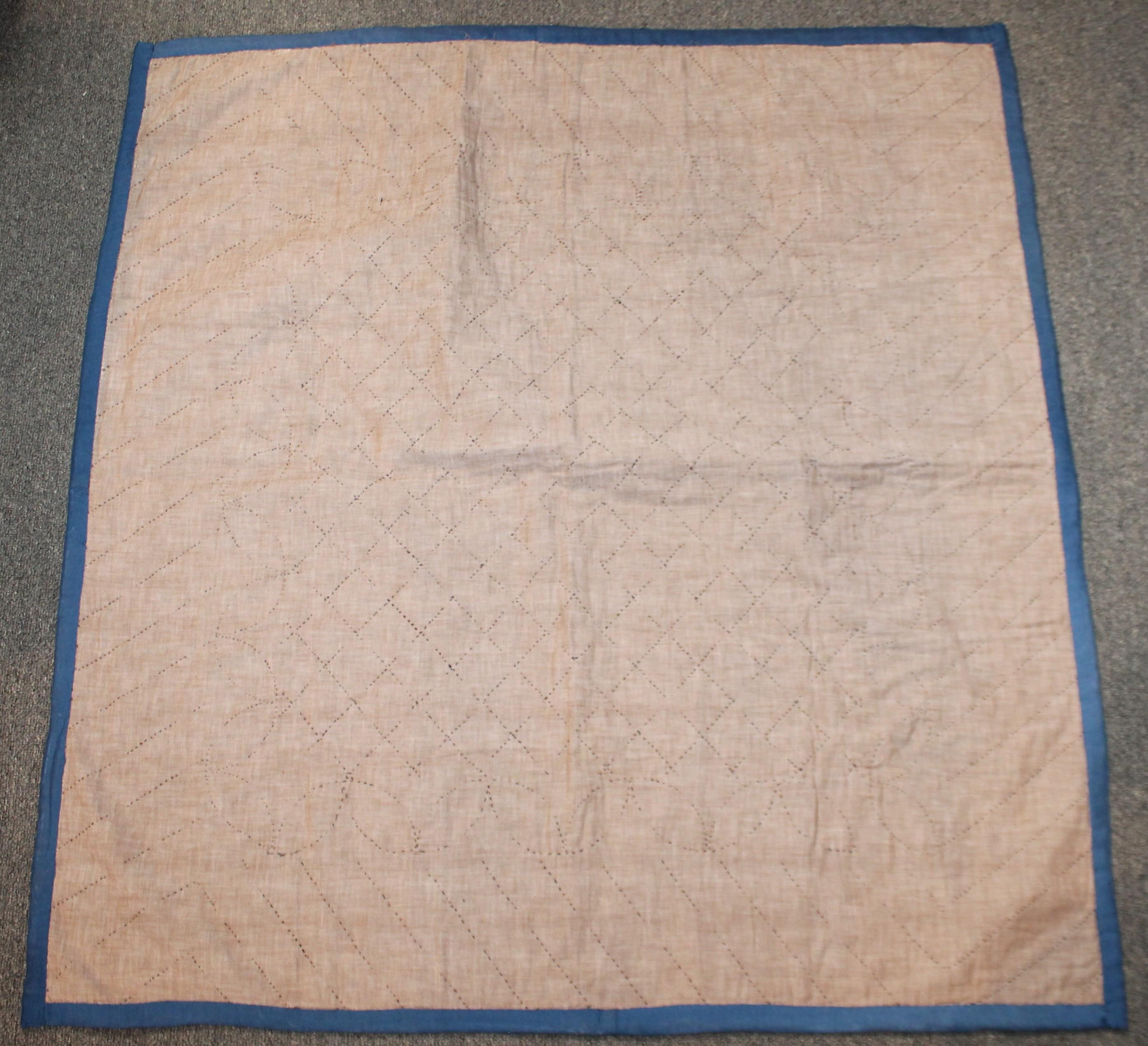 Fantastic and early square in a square Amish plain crib quilt. This quilt was found in Ohio.