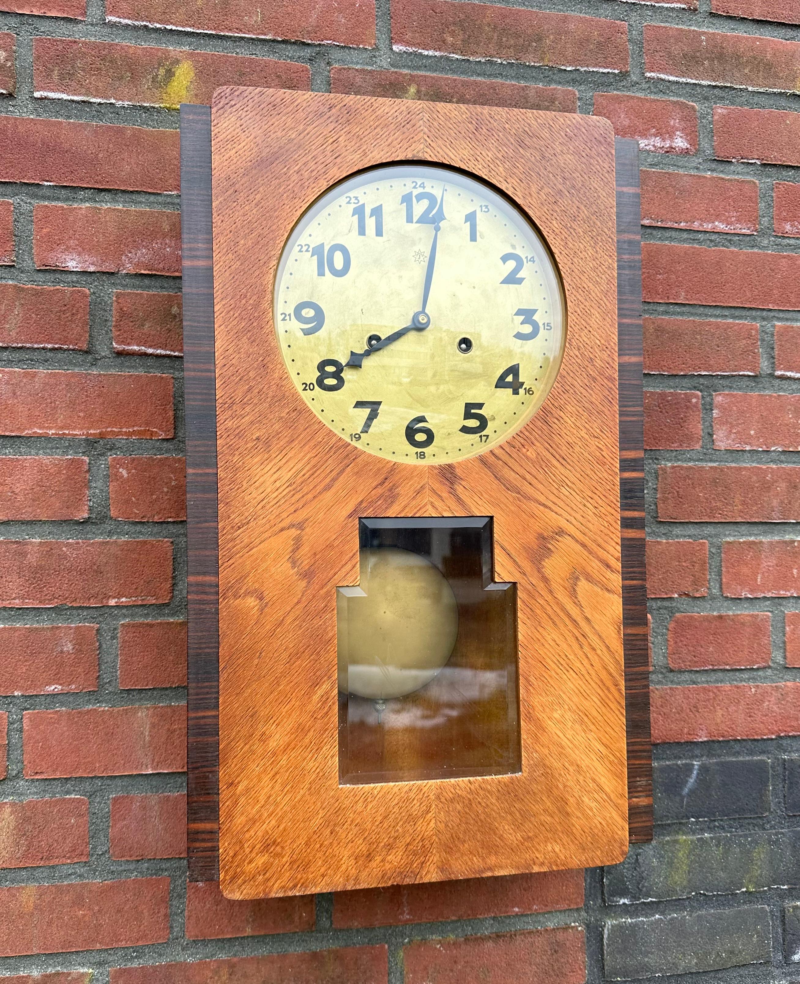 Early 20th century, great condition Dutch Arts & Crafts wall clock with original beveled and convex glass windows.

Over the years we have sold a few dozen Arts & Crafts table clocks. They were all beautiful and unique in design, but they ARE out