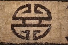 Rare et ancien tapis géométrique mongol ivoire