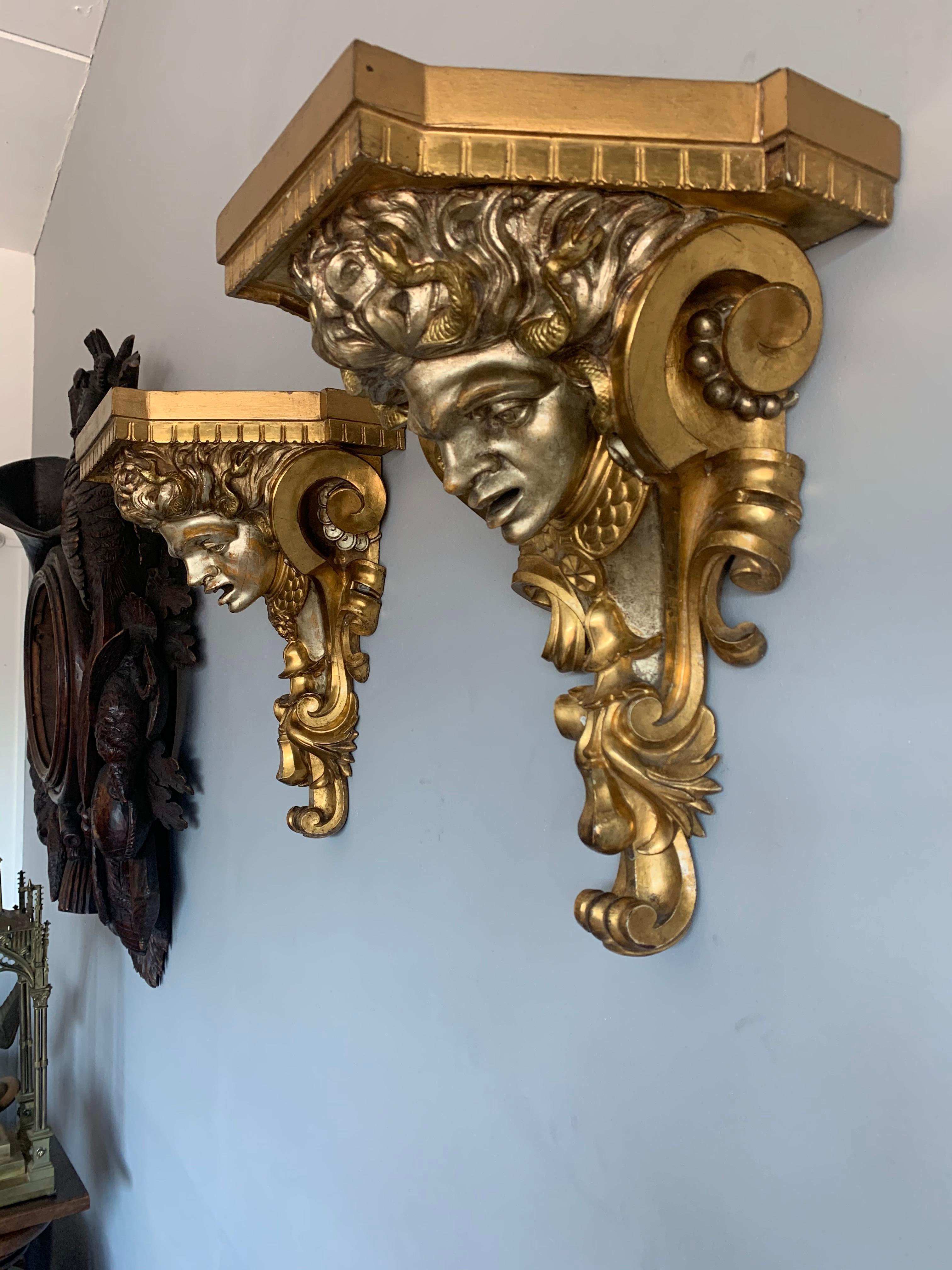 Matching pair of 19th century, Italian grotesque wall brackets or shelves.

This unique and amazingly hand carved pair of antique wall brackets is another one of our recent great finds.
The story of Medusa in Greek Mythology has been world famous