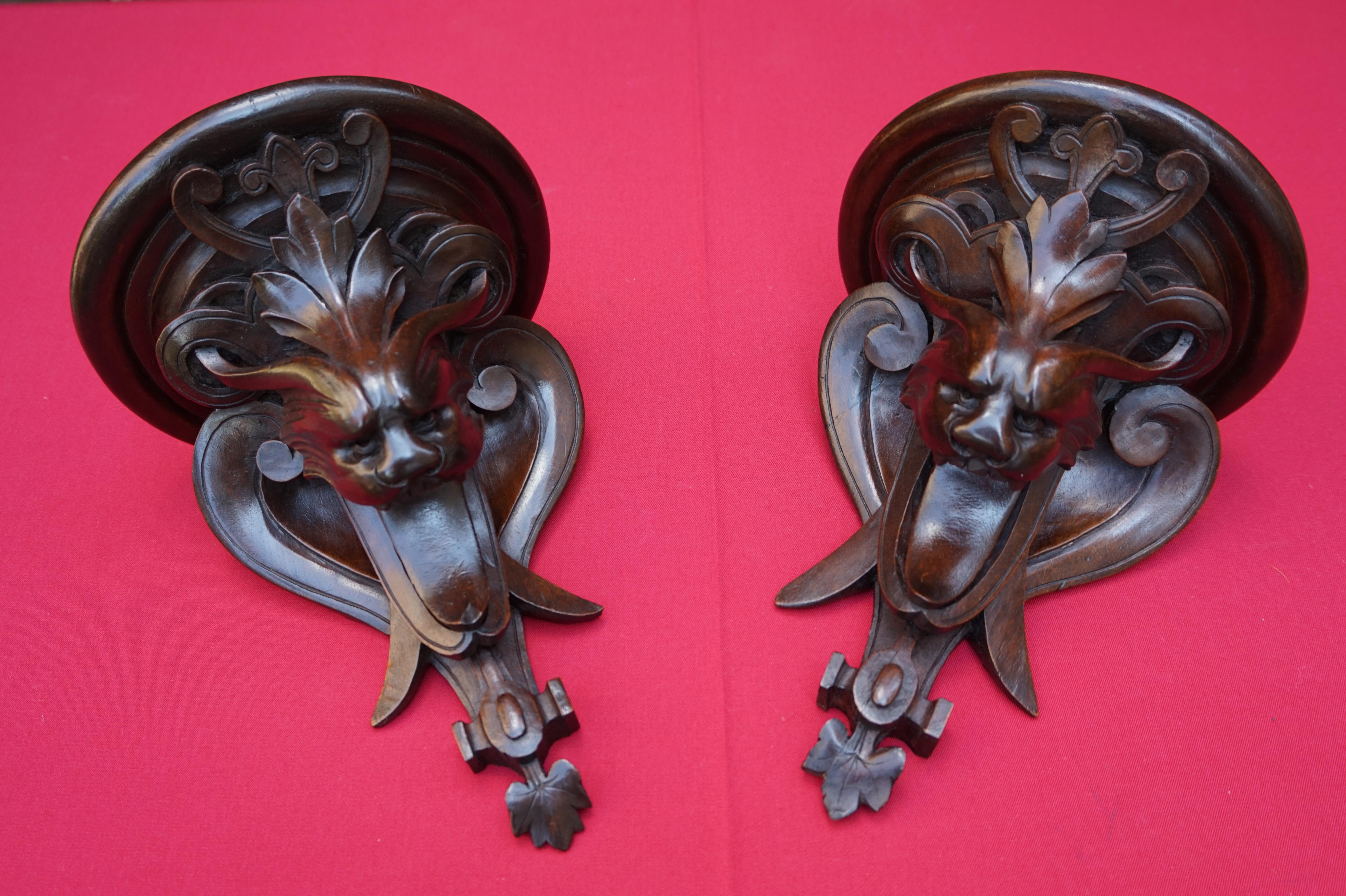 Pair of stunning, 19th century, Italian wall brackets/ shelfs.

If you are a collector of rare, Renaissance Style antiques in general and of the Grotesque Style in particular then this very rare pair of wall brackets could be yours to own and enjoy