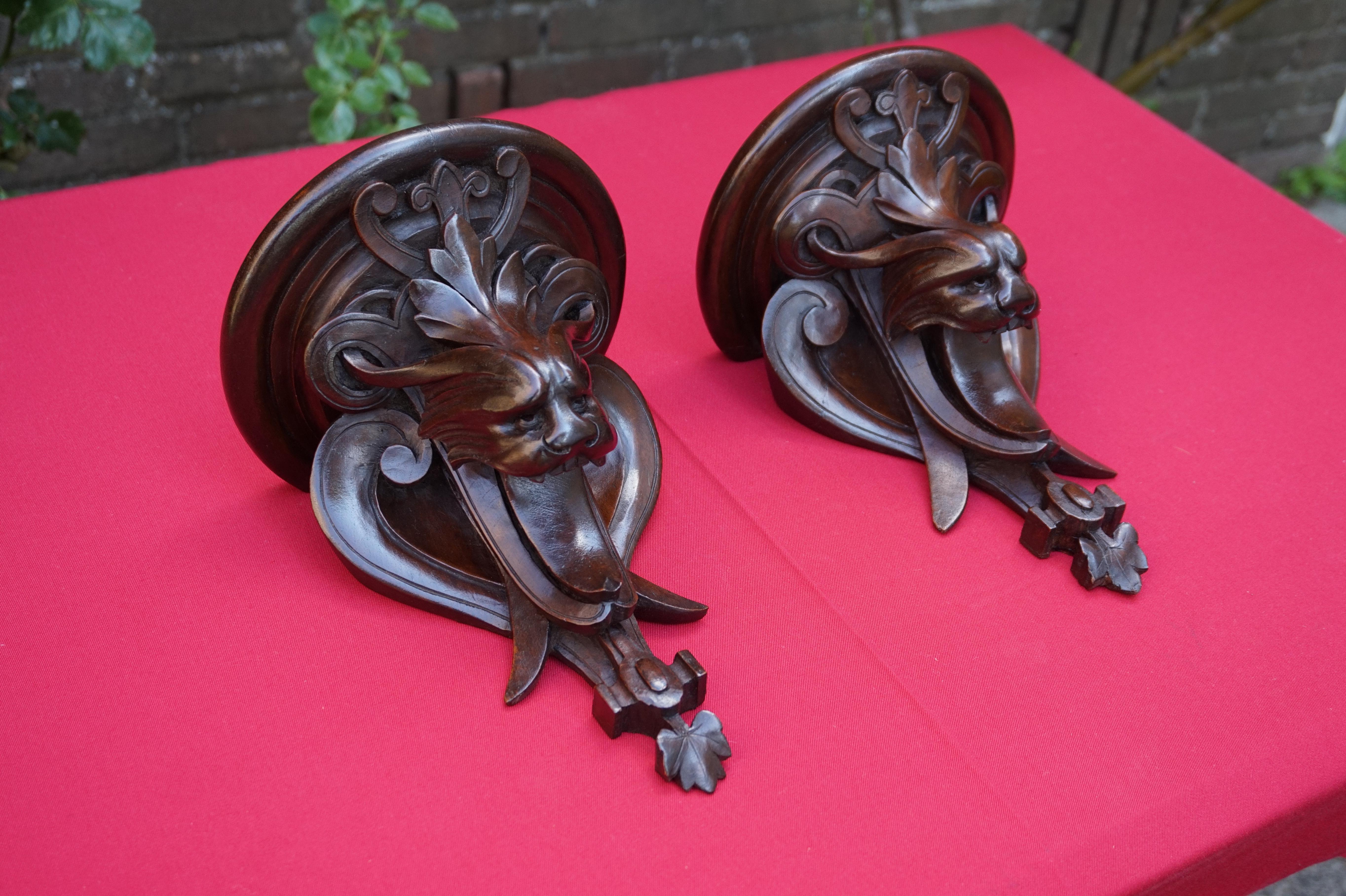 Walnut Rare and Antique Pair of Hand Carved Renaissance Revival Grotesque Wall Brackets For Sale