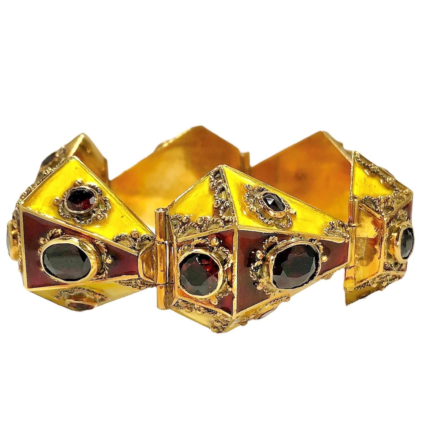 This wonderful and unusual bracelet was crafted in Italy at some time during the Mid-20th Century, While this genre is not at all unusual in charms, pendants and earrings, it is extremely rare to find bracelets made in this style. The piece is