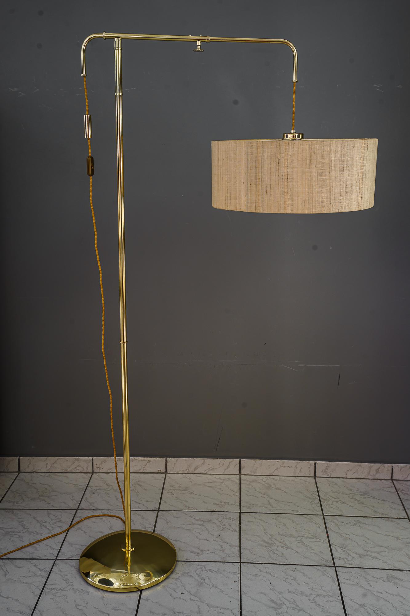 Rare and big adjustable floor lamp with original shade by Kalmar around 1950s
Adjustable from 74cm up to 90cm ( deep )
Polished and stove enameled
Original shade ( good condition ).