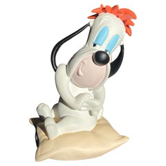 Statue de figurine rare et de collection d'un dauphin sur un coussin par Demons & Merveilles