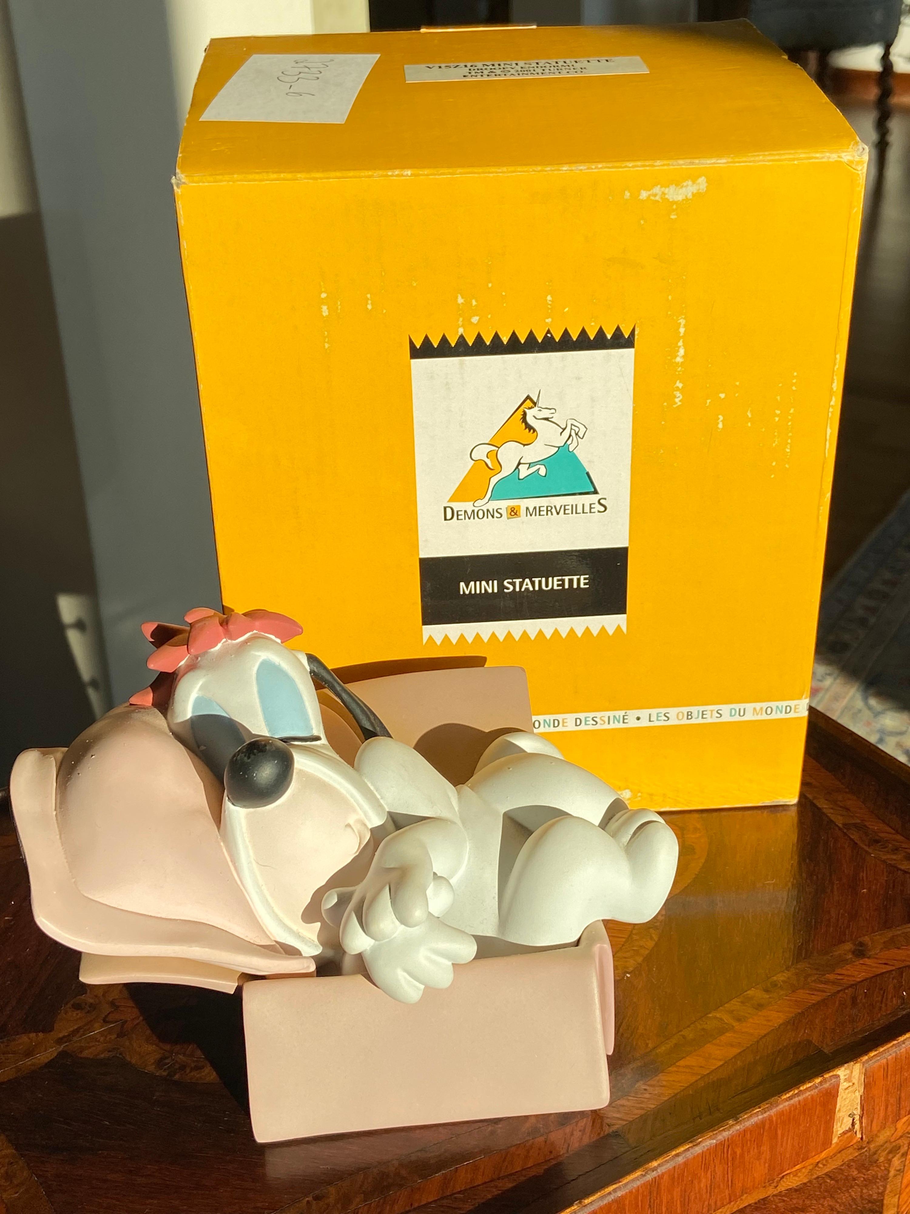 Rare figure of sleeping Droopy made out of polystone resin.
This is an official licensed Tex Avery figure. 
Pre-owned but in perfect shape in original box.
Perfect gift and a part of a large collection.
USA, 2001.
 
  