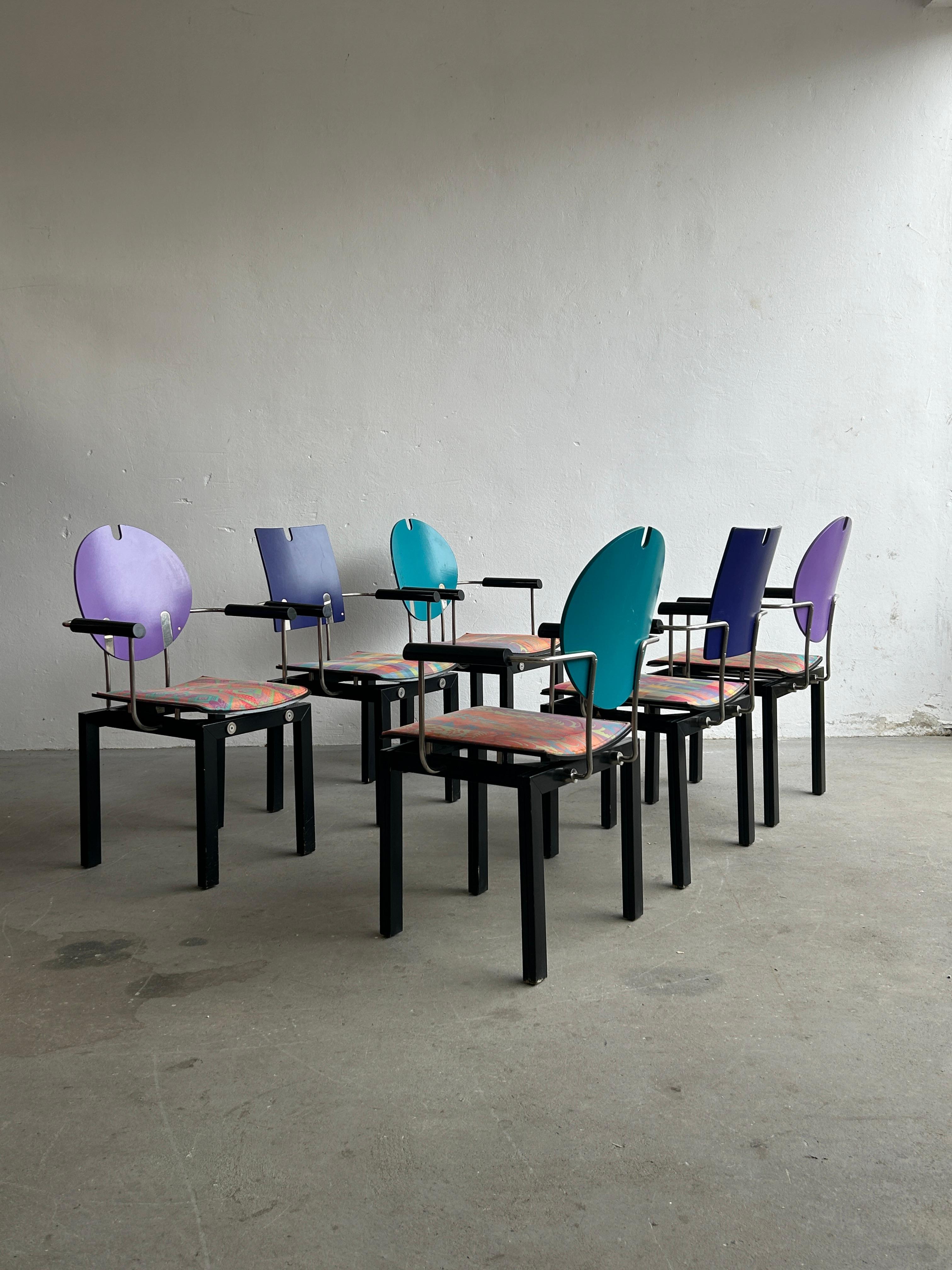 Exceptionally rare and collectible set of six postmodern Memphis era, original Thonet Vienna dining chairs. Sculptural, geometrically shaped colourful structure.
Produced by Thonet Vienna in 1994.

The set includes all six chairs in the photos,