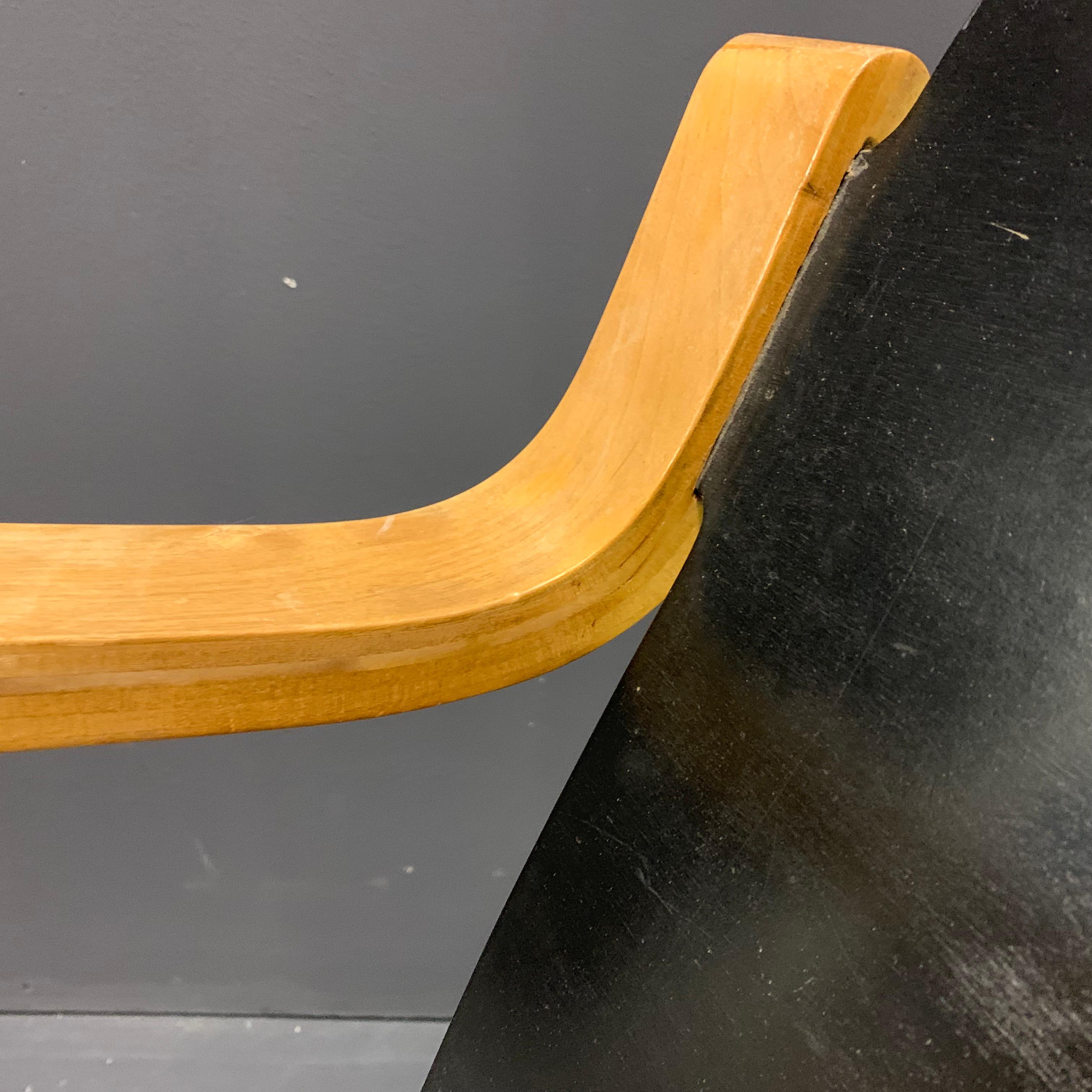 Very rare and from the 1. Edition with original black lacquer. Small imperfection on the left runner. Might be a spot, scratch or old repair. Does not effect the use in any way and is hardly visible. Signed to the underside of both runners with