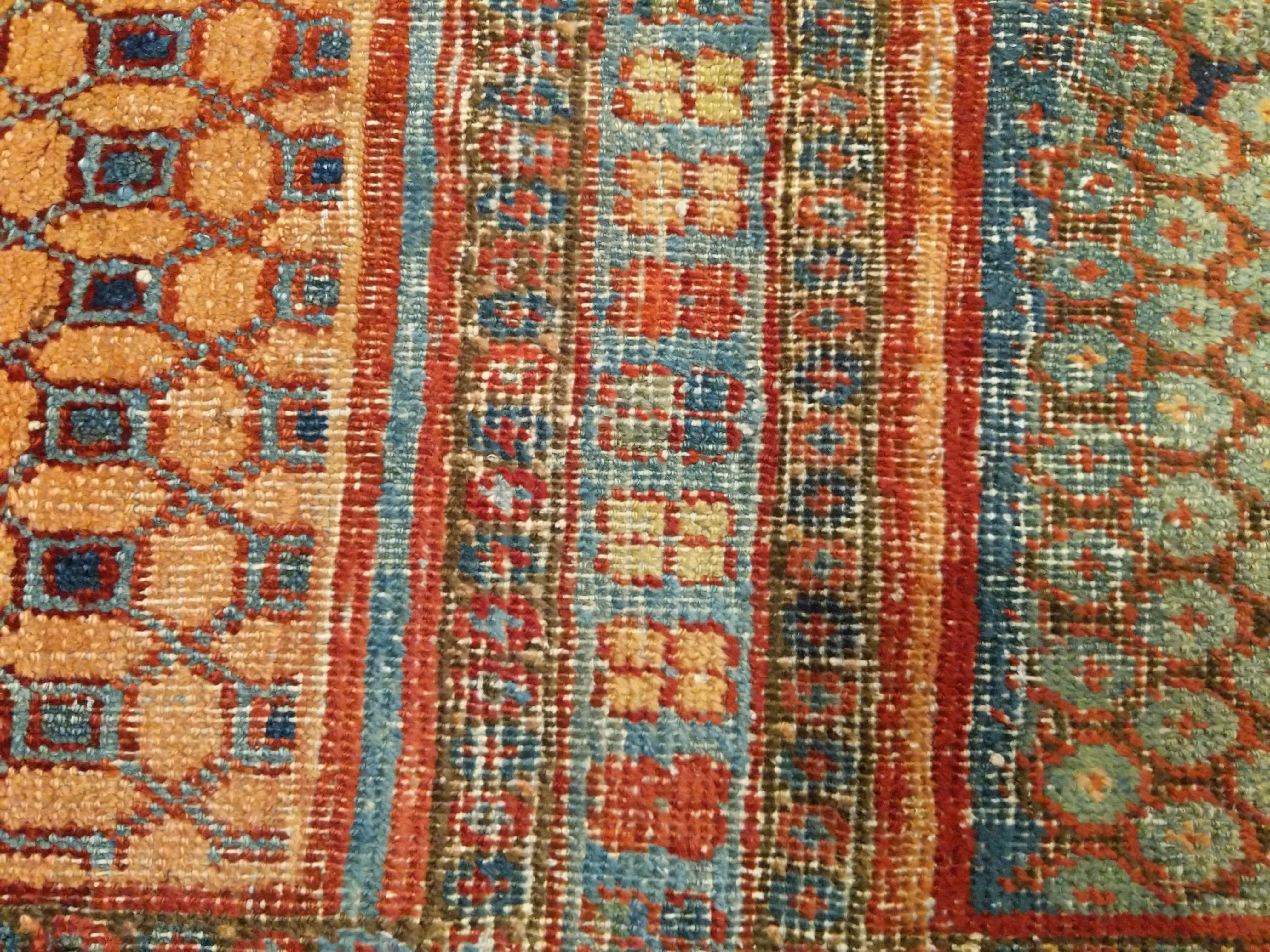 Wool Rare and Early Khotan Rug with Two Niches For Sale