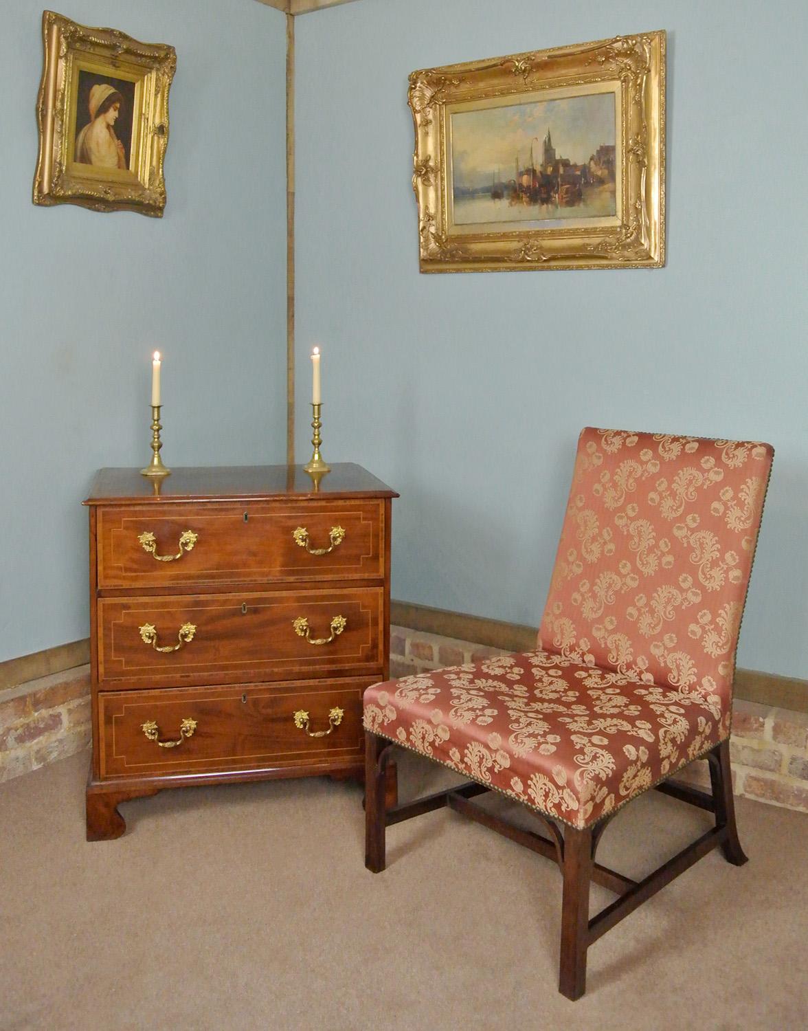 A very unusual and rare George III side chair made in solid teak and in excellent original condition, the hand carved spandrels original also and with a beautiful warm and rich well developed colour to the teak frame.

The chair is solid without