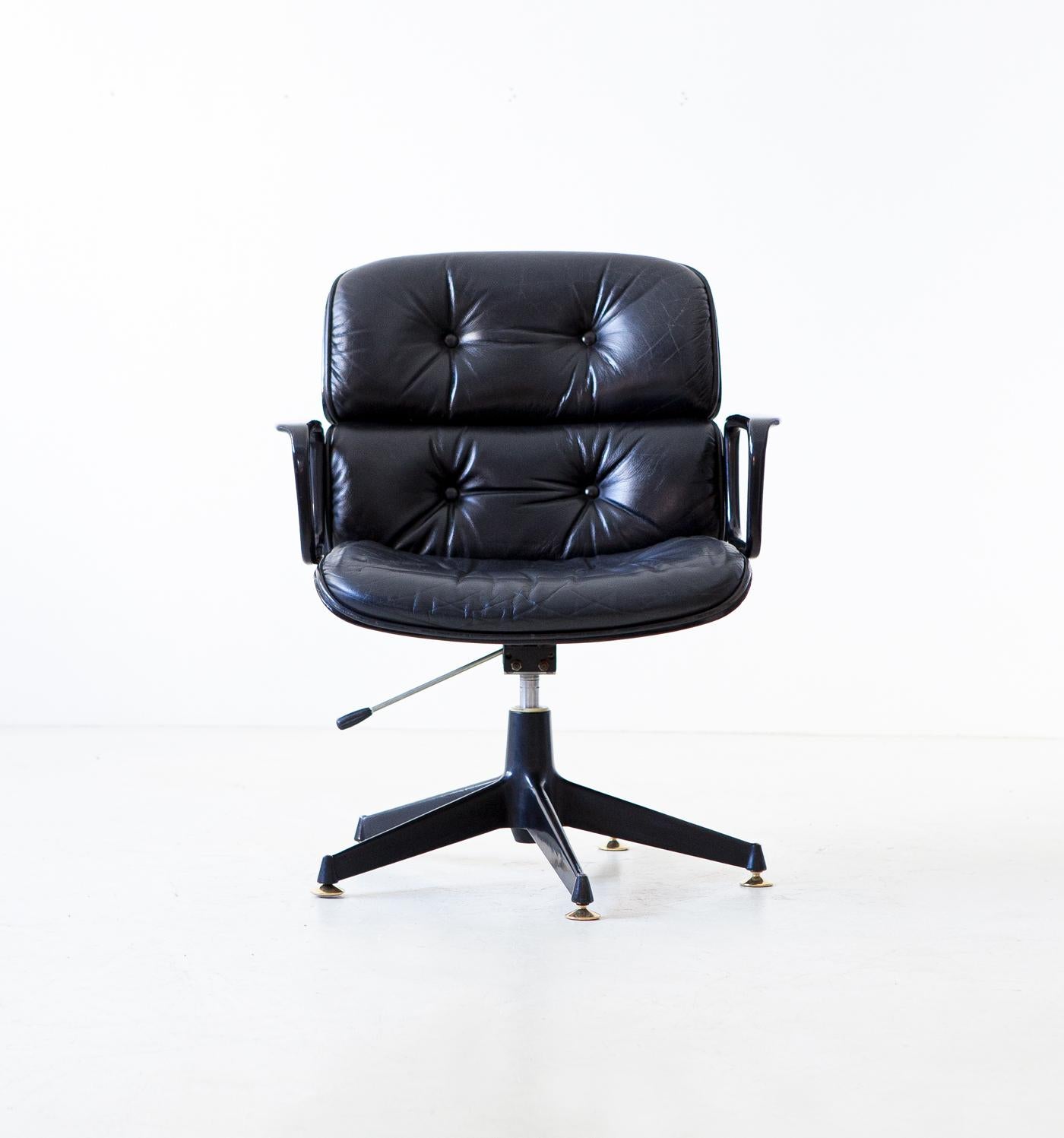 Office swivel armchair designed by Ico Parisi and produced by M.I.M. (Mobili Italiani Moderni) Roma, Italy

This is the  executive model with double back from of the 1960s.

Fully restored curved wooden frame with a new shellac finishing, new black