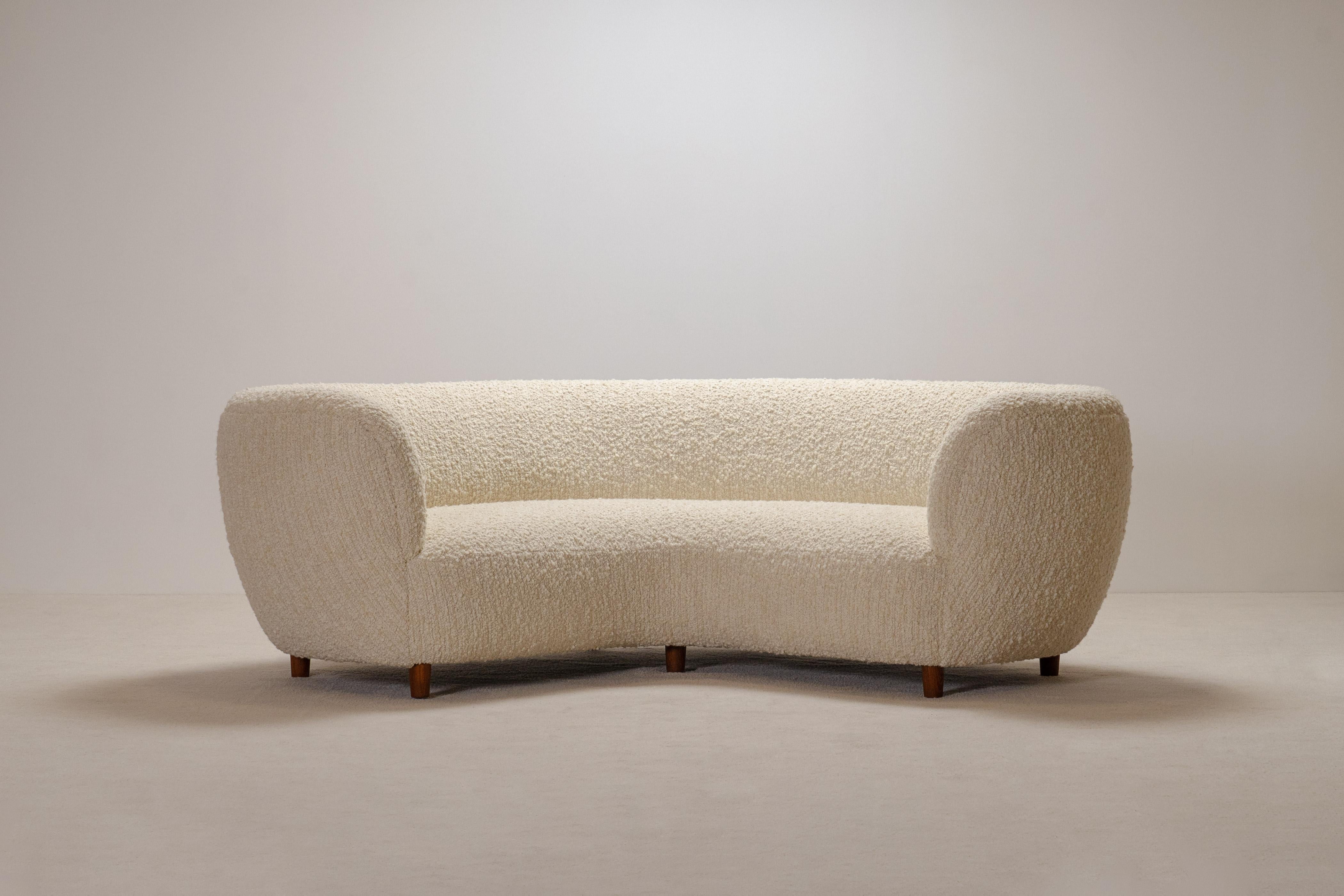 Scandinavian Modern Rare and Gorgeous Danish Curved Sofa from the 1940s. Newly Uphostered.