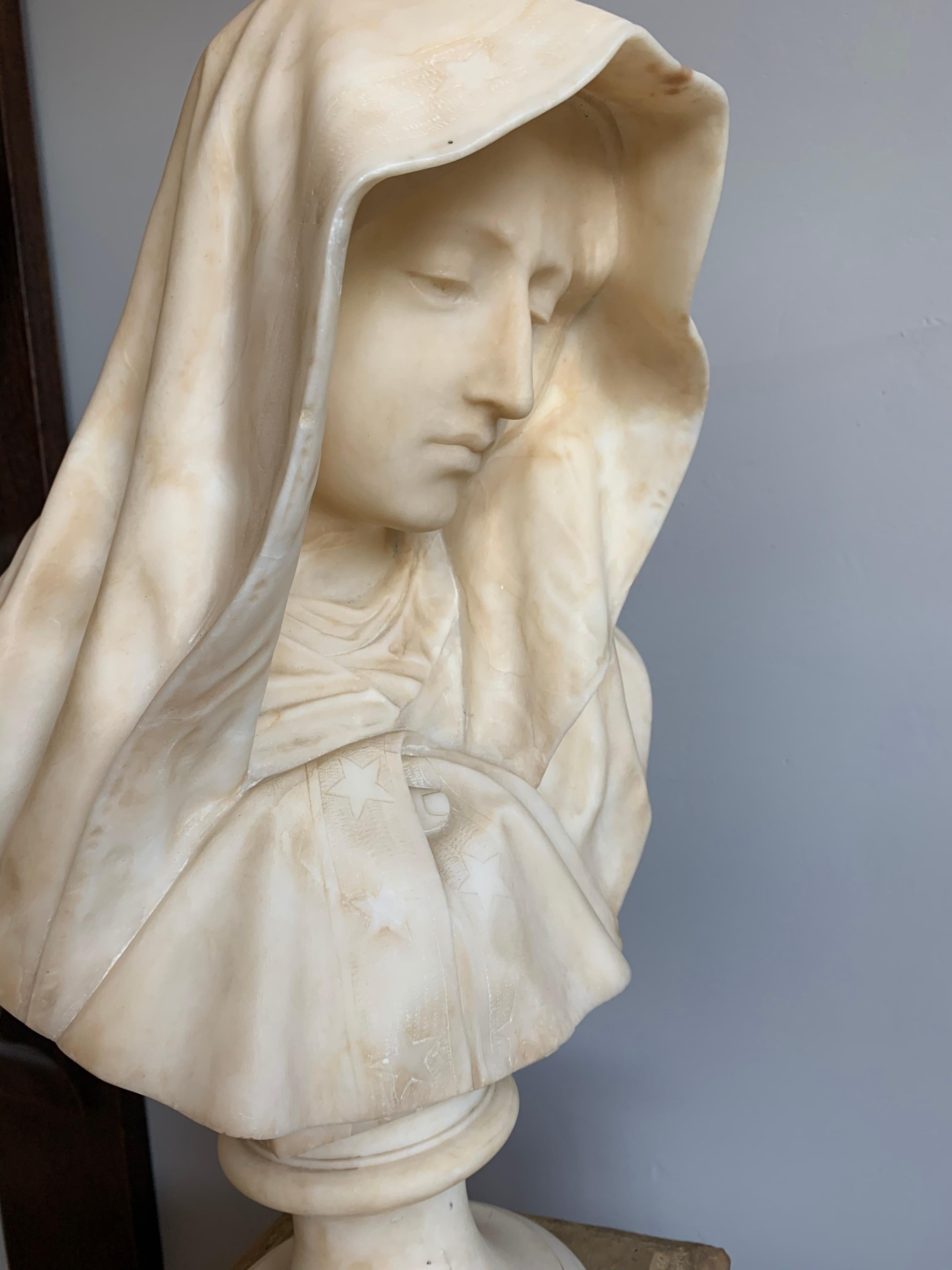 Good size and marvelous quality Madonna sculpture on a velvet, wooden base. 

If you are a collector of antique and top-quality religious artefacts then this hand carved Virgin Mary could be gracing your home or house of prayer soon. Judging from