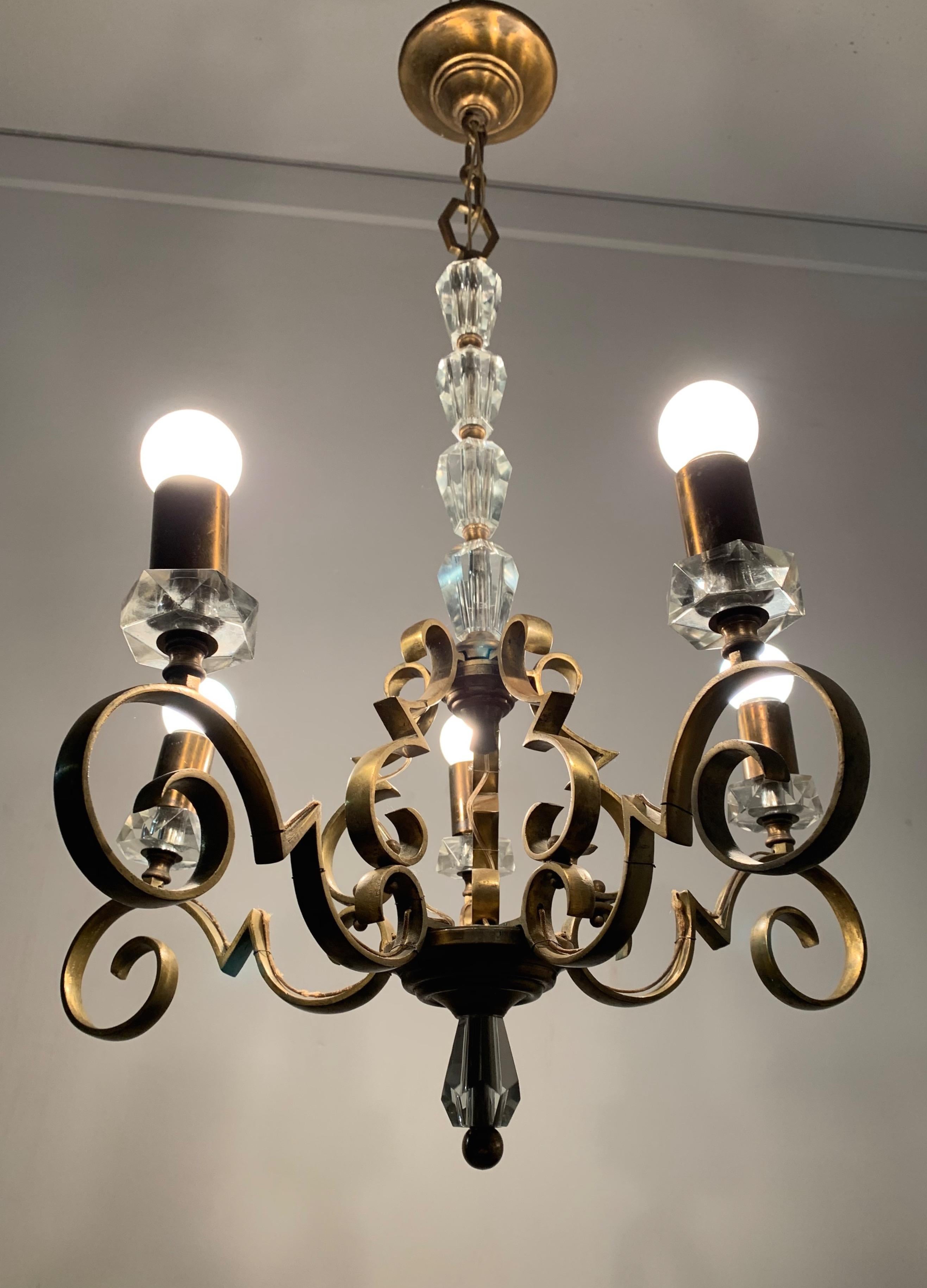 Very stylish and high quality French Art Deco pendant light.

This beautifully handcrafted fixture from the 1920s is another striking example showing that the French probably were the best designers and manufacturers when it comes to early 20th