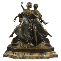 Rare and impressive J. Descomps art deco bronze group. roses dancers