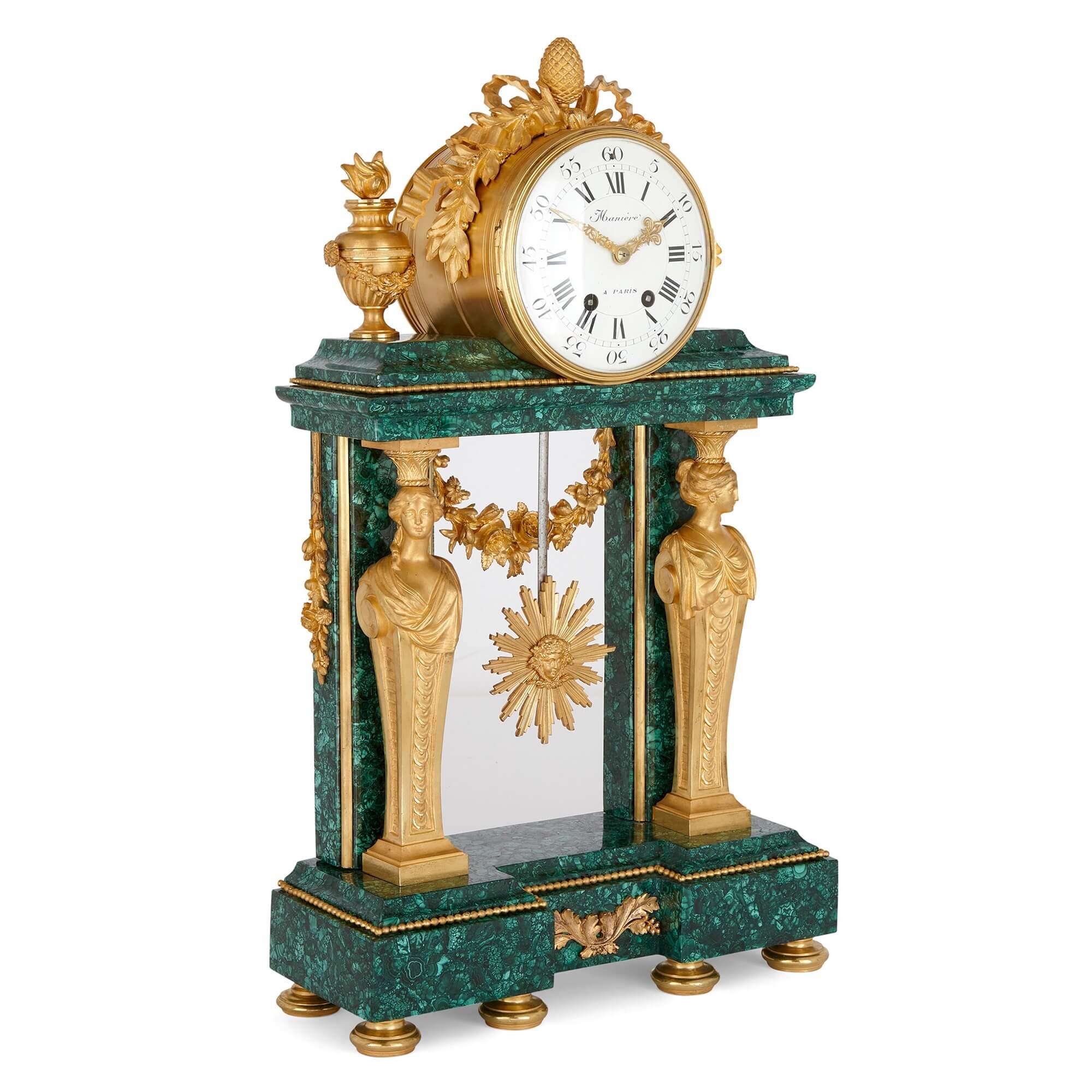 Rare and large ormolu mounted malachite mantel clock signed Manière
French, 19th Century
Height 60cm, width 35.5cm, depth 13cm

With an enamel dial signed 'Maniére / A Paris', this magnificent Neoclassical mantel was made in France in the 19th