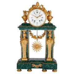 Rare and large ormolu mounted malachite mantel clock signed Manière