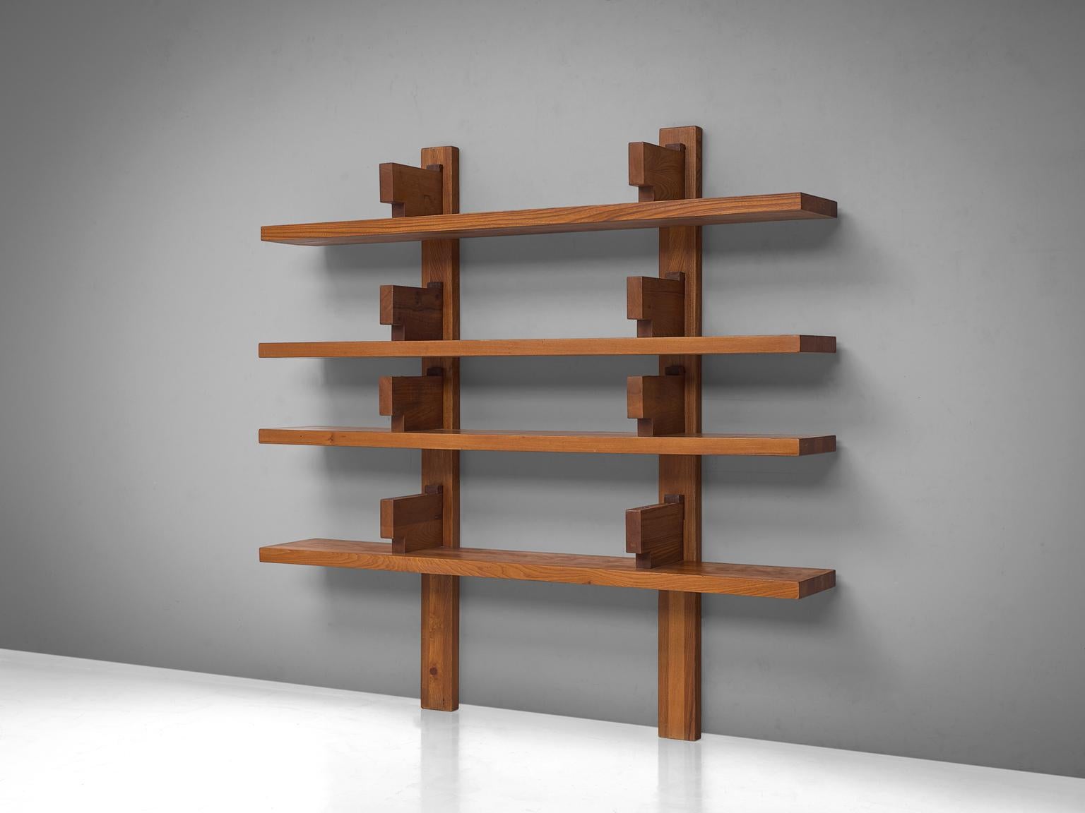 Pierre Chapo, Bibliothèque, model no. B17, elm, France, 1967.

The shelving system was created in 1967 were is was presented at the Salon des Arts Ménagers. This robust and solid bookcase consist of four elm shelves that rest under brackets.