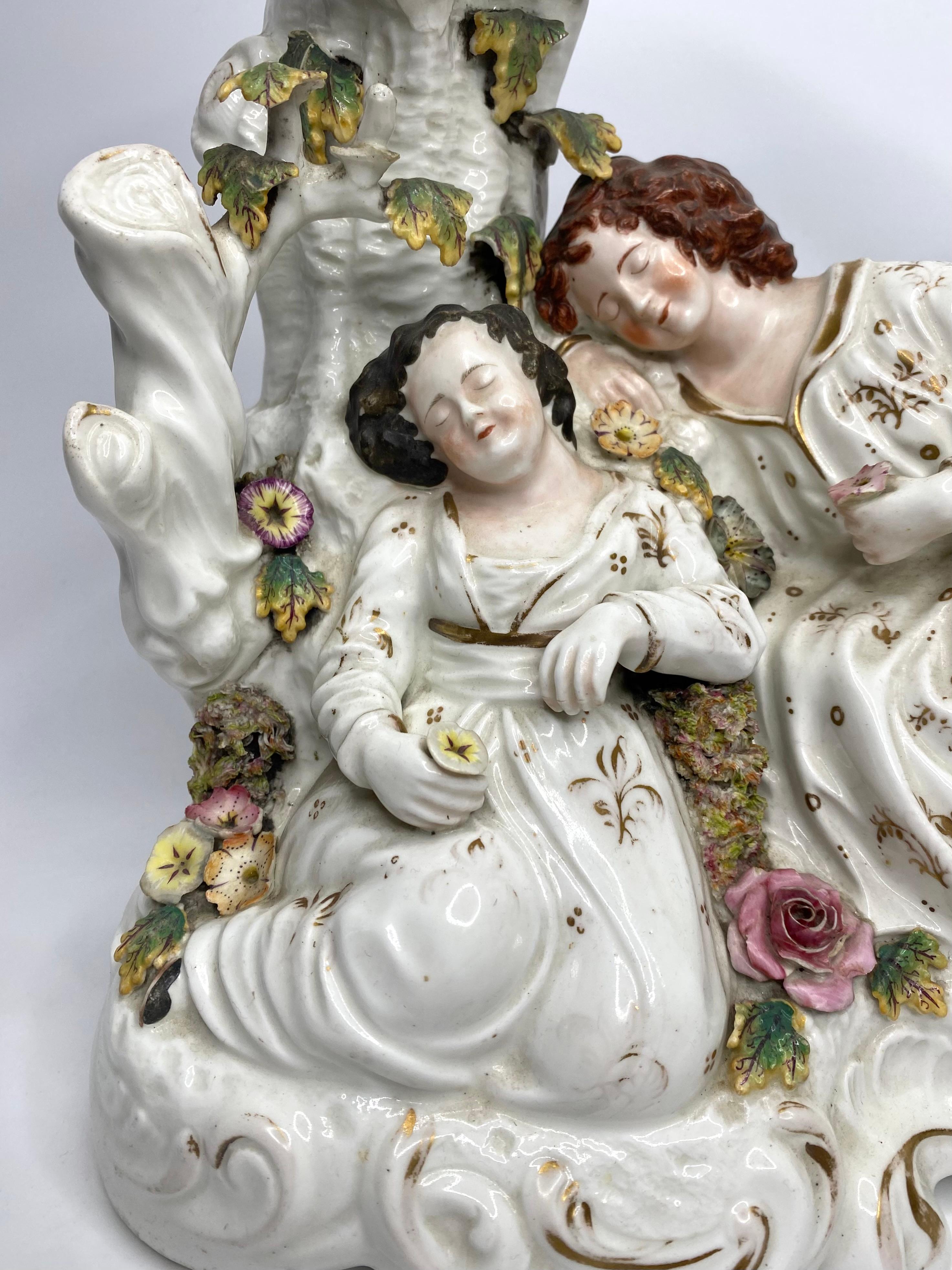 A very rare, and extremely large Staffordshire porcelaneous group,’Babes in the Woods’ spill vase group, c. 1830. Finely modelled, as two young girls, their details picked out in flesh tones, sleeping beneath an arbor, between two trees acting as