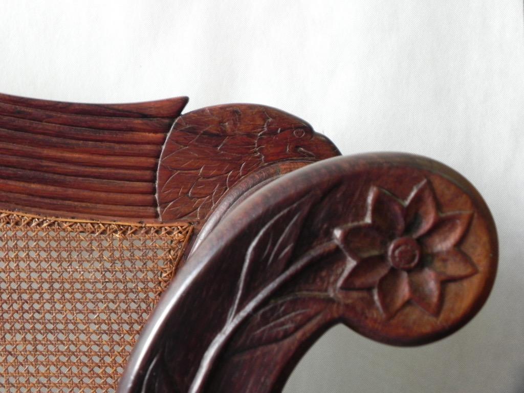Immerse yourself in the timeless elegance of this Brazilian Empire Settee, circa 1850, a captivating piece that exudes history and craftsmanship. Originating from a prominent coffee plantation, this settee reflects the grandeur of Brazil’s Imperial