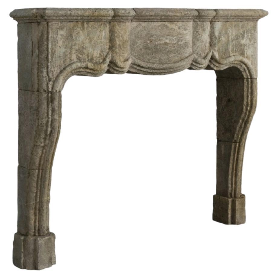 Rare and Old Reclaimed Italian Limestone Fireplace Mantel For Sale