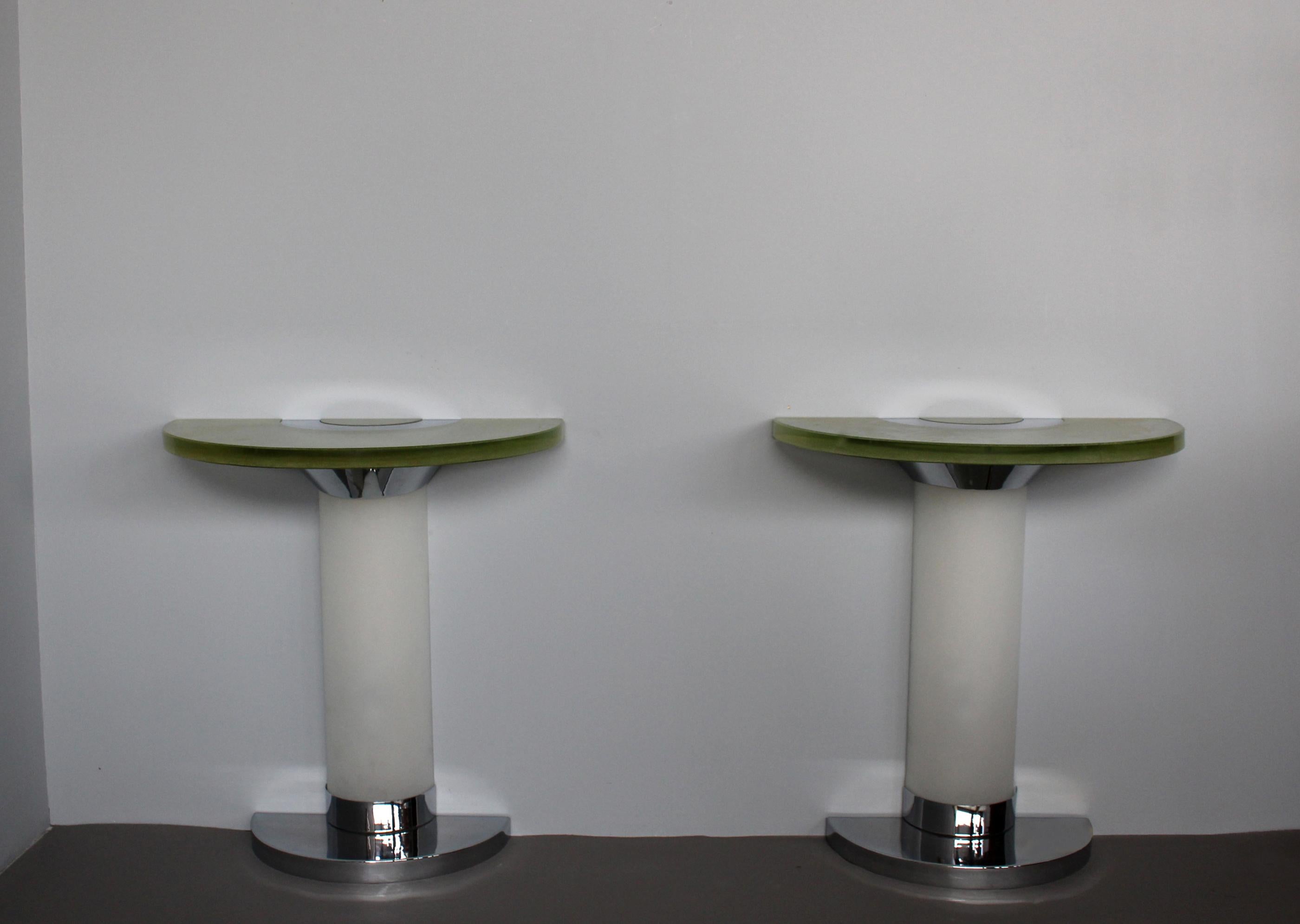 Jean Perzel (1892 - 1986) - A pair of fine French Art Deco illuminated glass and chrome demi-lune consoles with their original Saint Gobain glass tops.