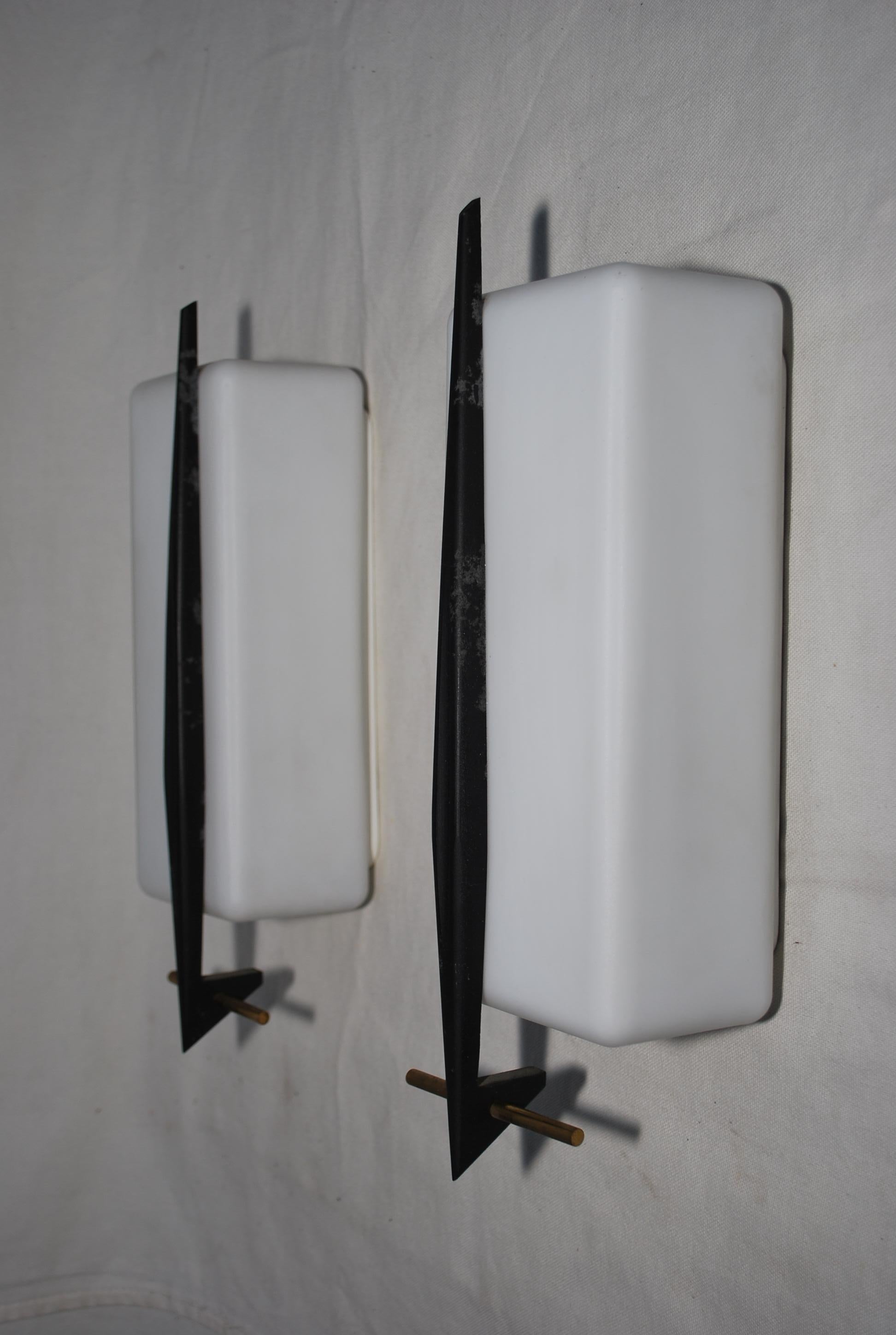 A sexy French 1950's outdoor or indoor sconces, they are quite rare
