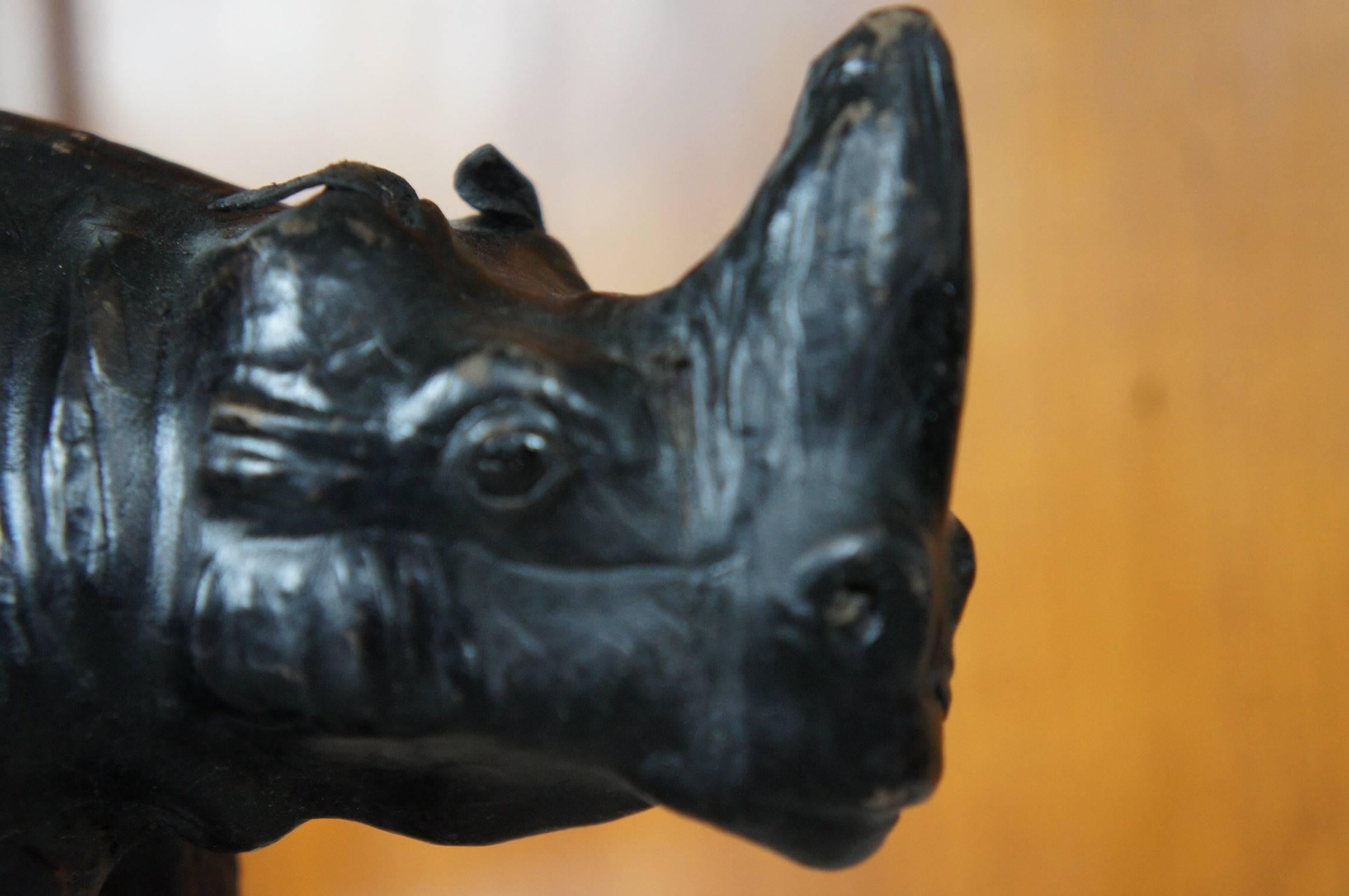 Rare and Small Pair of Black Rhino Sculptures Leather on Wood with Glass Eyes In Good Condition For Sale In Lisse, NL