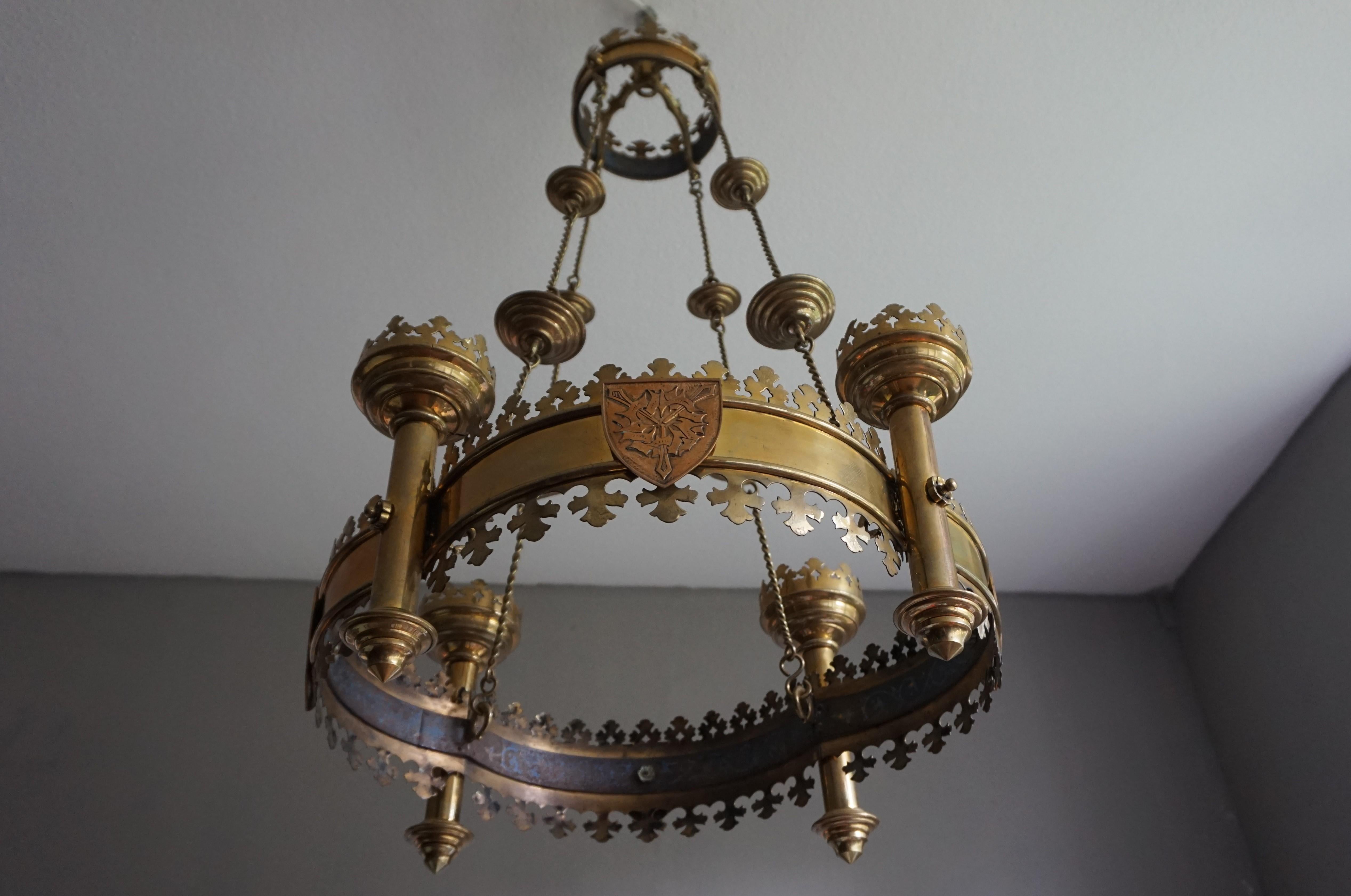 Beautiful and meaningful church relic from the late 1800s.

This stunning and all handcrafted candle chandelier from the 1880s is designed in the shape of an advent wreath. When we first saw this work of religious art last week, we directly searched