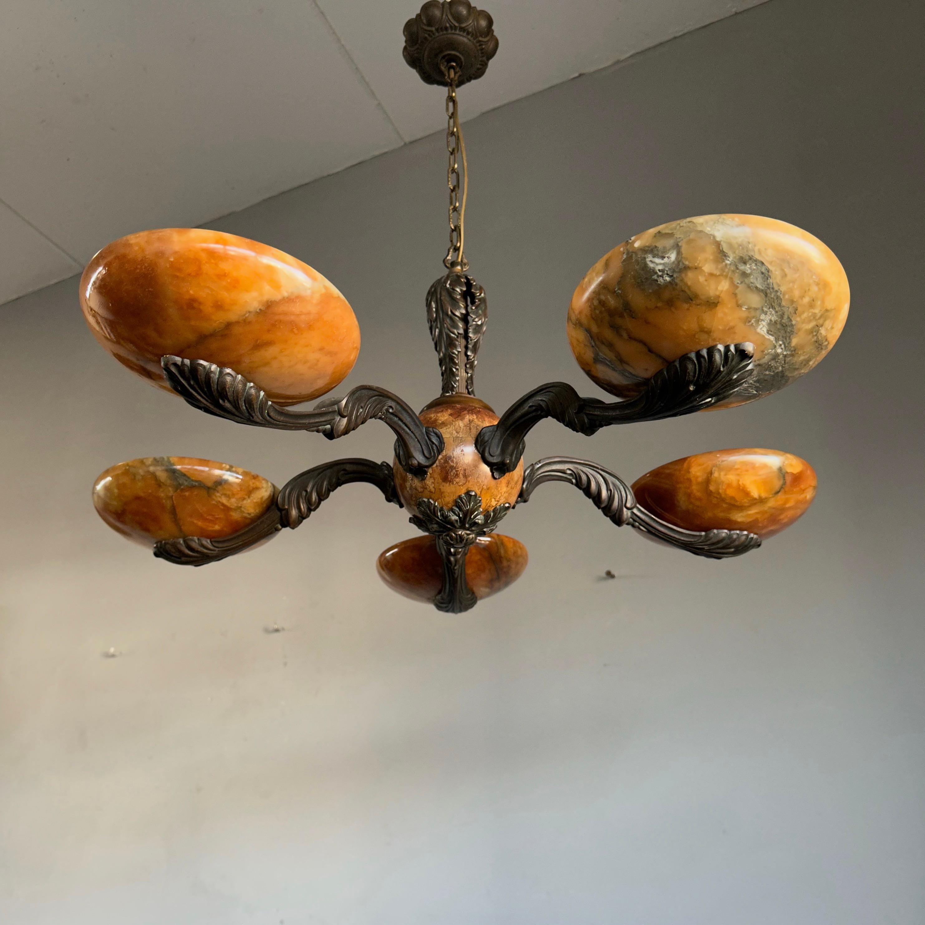 Unique, elegant and well balanced pendant light.

If you are looking for an antique and classy light fixture to grace your living space then this stunning light from the European Arts and Crafts era could be your to own and enjoy soon. This
