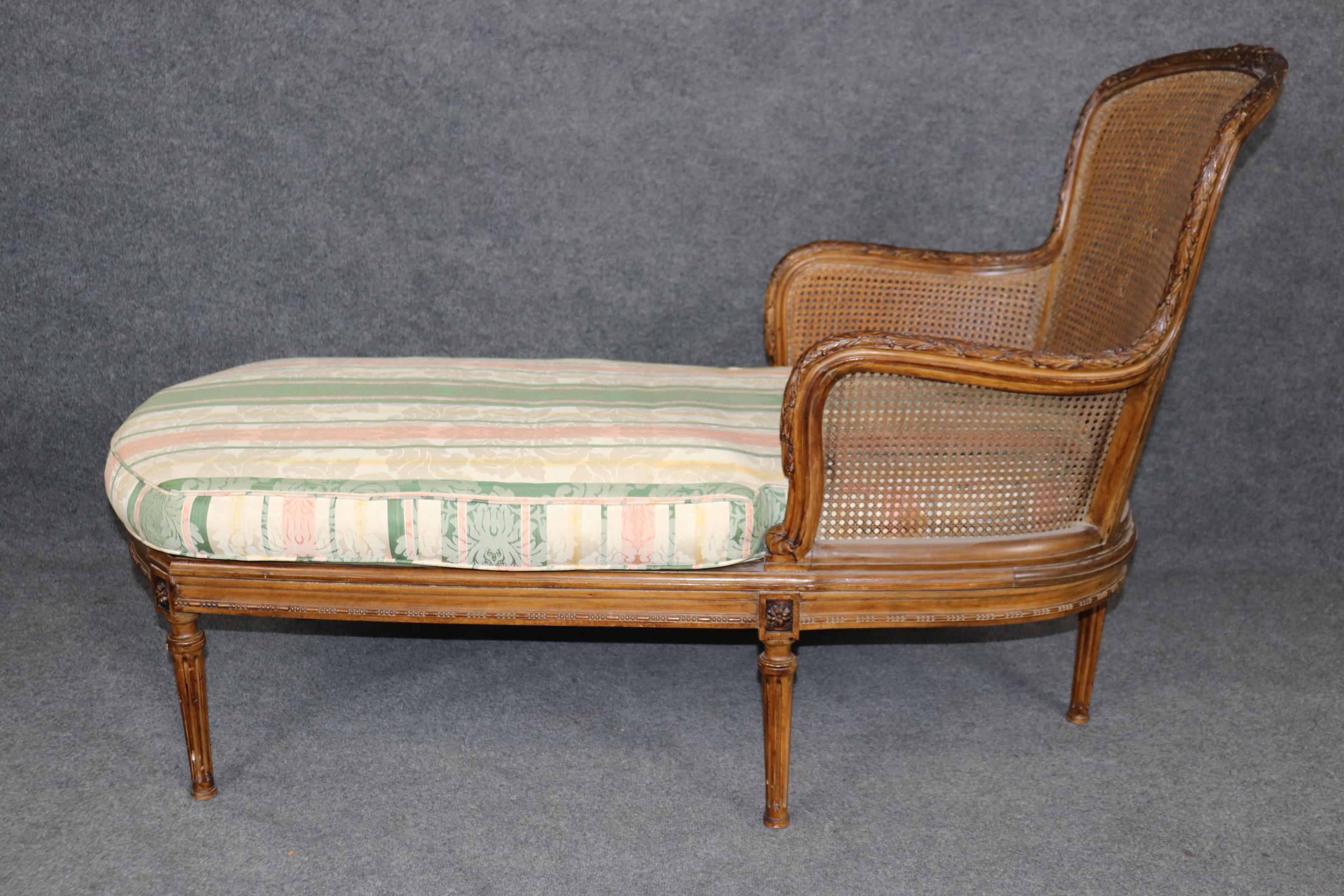 Early 20th Century Rare and Unique Carved Walnut Damask Upholstered Caned French Louis XVI Daybed