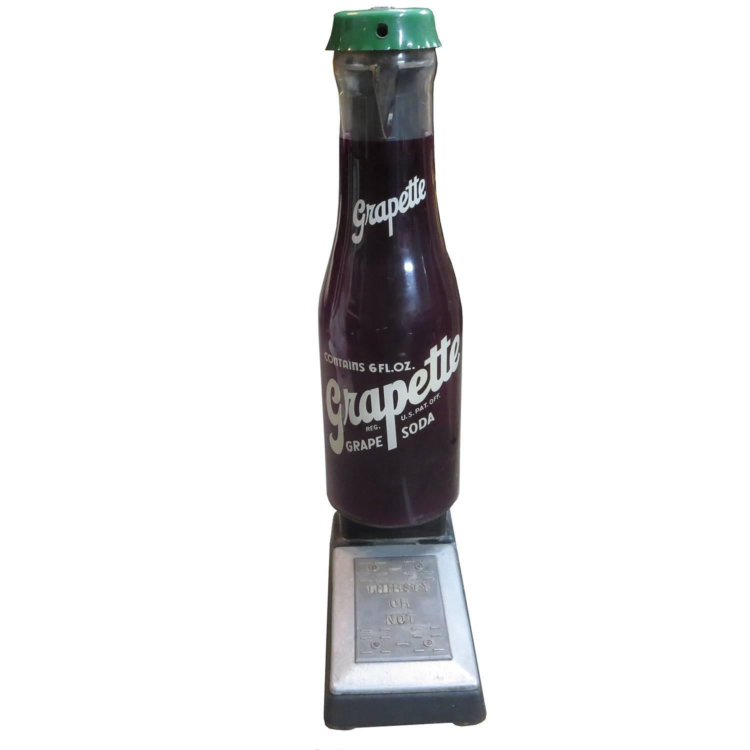 Advertisers were always looking for a unique spin to sell products, and this standing scale is as unique as they come! Placed in a market or cafe, this bottle would remind you to pick up a Grapette soda. Even the metal foot plate suggests 