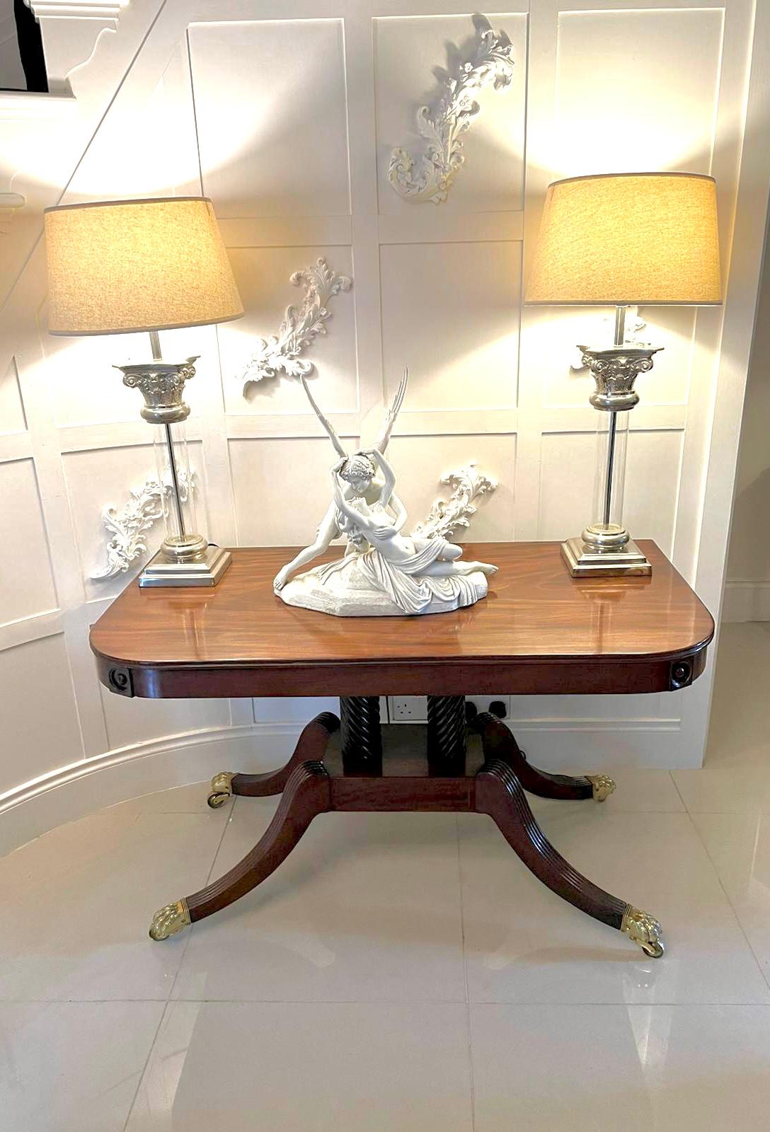Rare and unusual large antique regency quality mahogany D shaped metamorphic table having a wonderful quality mahogany D shaped top with a reeded edge and a D shaped frieze. It boasts a drop leaf to the back making a console table which folds up to