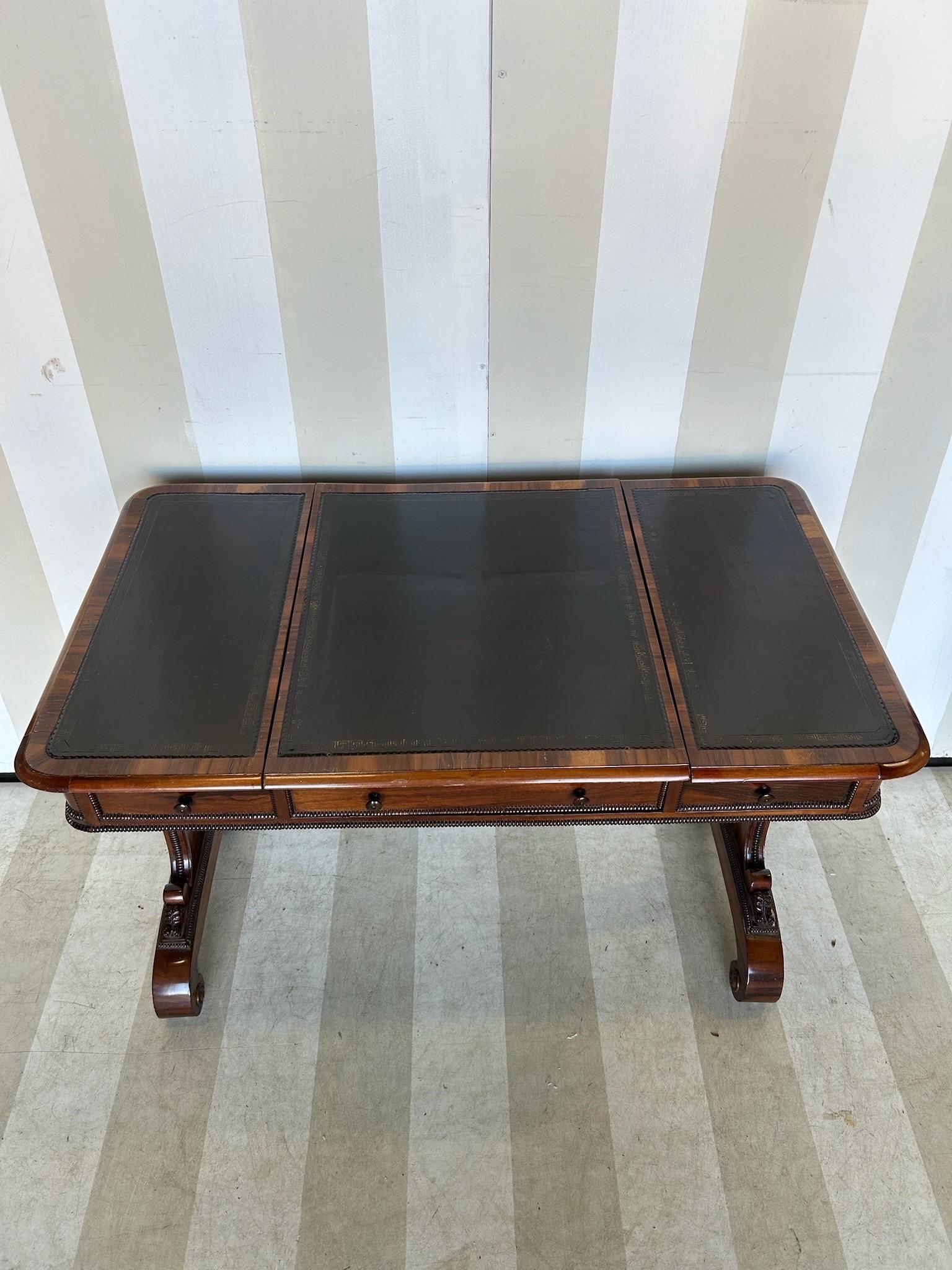 Rare and Unusual Regency Period Metamorphic  Leather Top Architects Desk and Games Table made of Rosewood. The top lifts to display plans or folios with a removable clip. The top also slides forward to reveal a removable checkerboard over a