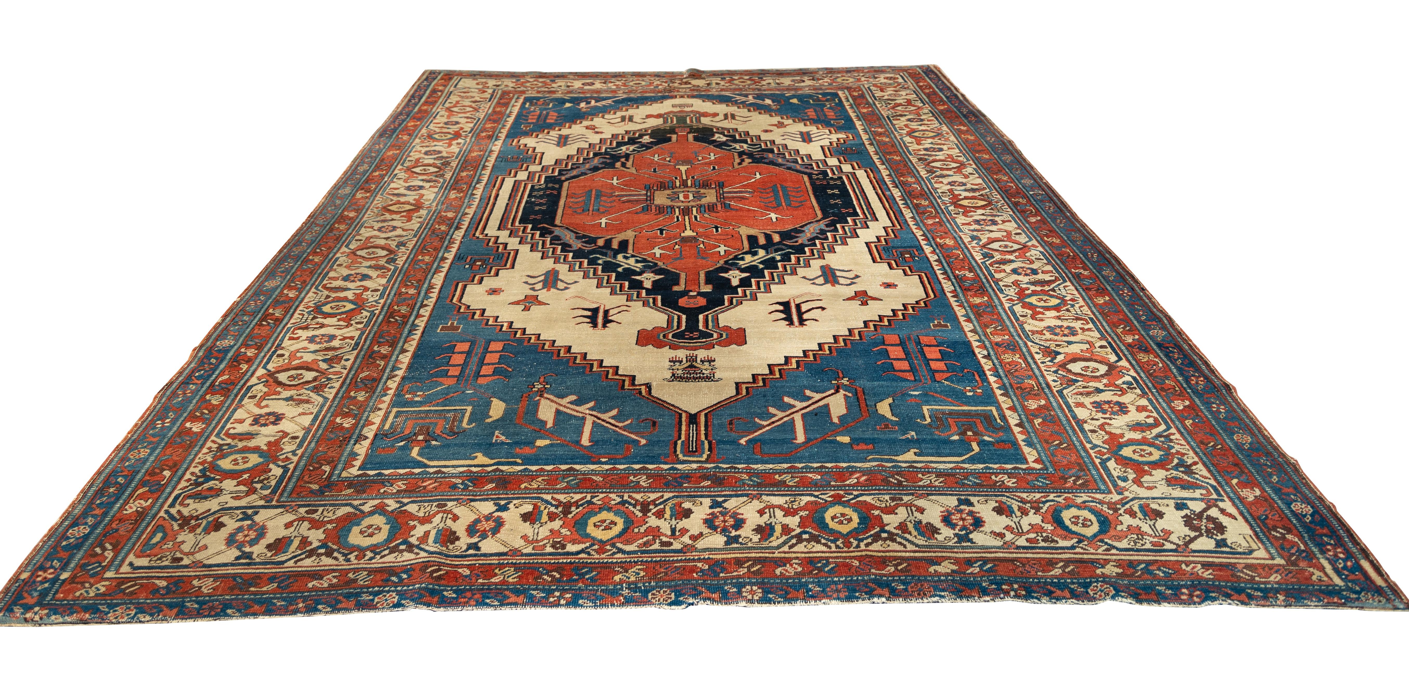 Antique and extremely enigmatic Bakshayesh rug featuring a striking geometric medallion design set within a vertically oriented rectangular field. The central medallion is a large tribal rust red with stepped edges and stylized botanical motifs,