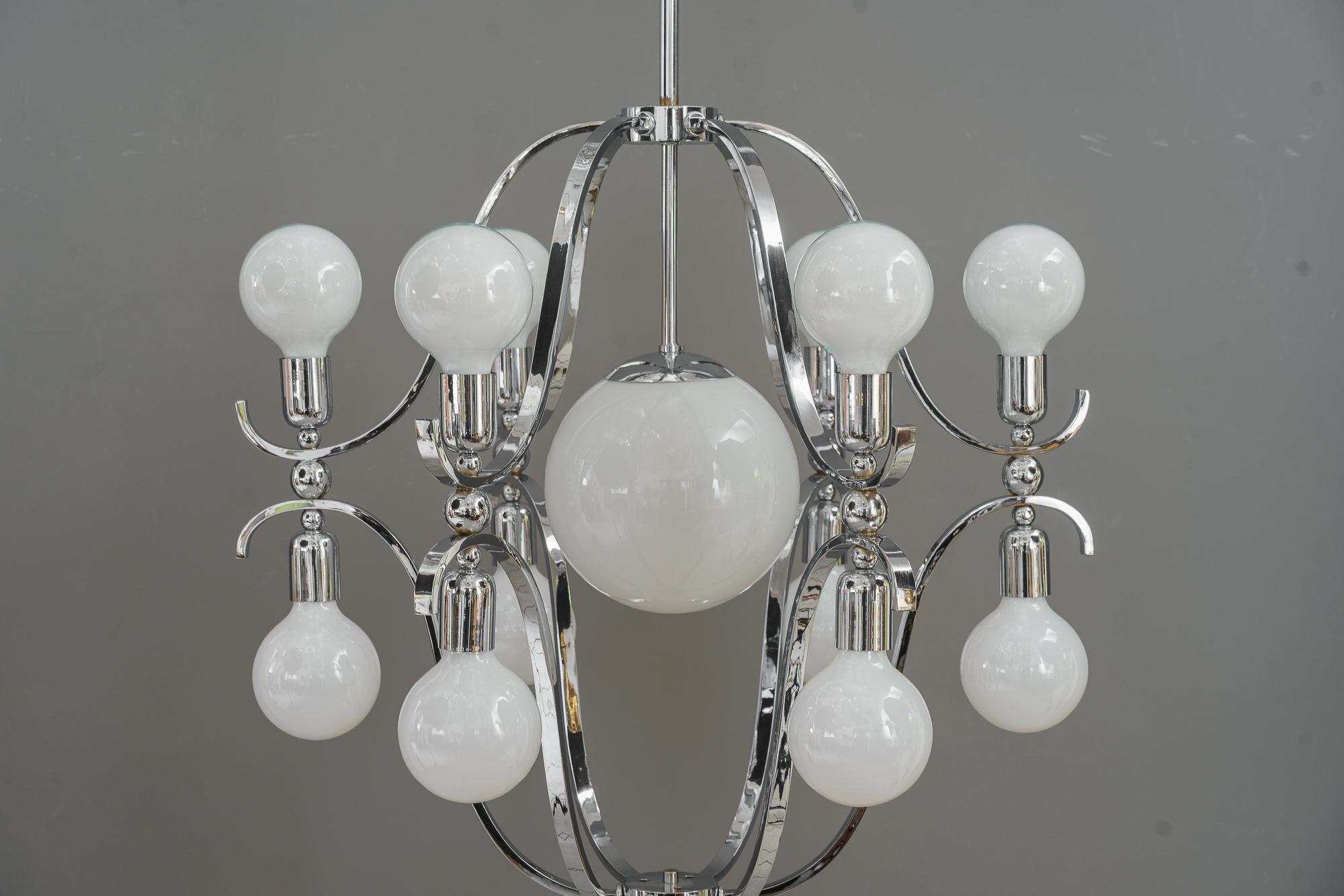 Rare and very big chrome chandelier vienna around 1920s
Lower part without the stem is 90cm
Good original condition
we have different bulb sizes. ( you can choose )
Only the middle one is a glass shade, the other ones are big bulbs.