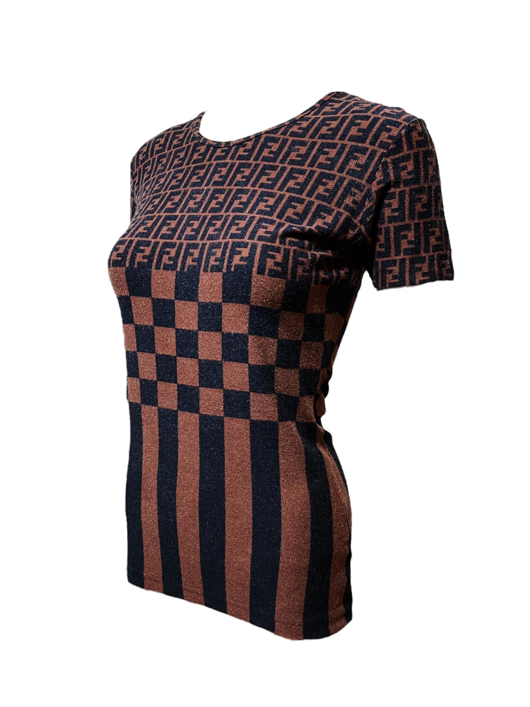 The FF capsule collection. Vintage 90’s Fendi Mare - Zucca Monogram T Shirt. Super soft and stretchy summer shirt. It Features iconic F monogram along with checker and striped print. The collection celebrates something very dear and represents so