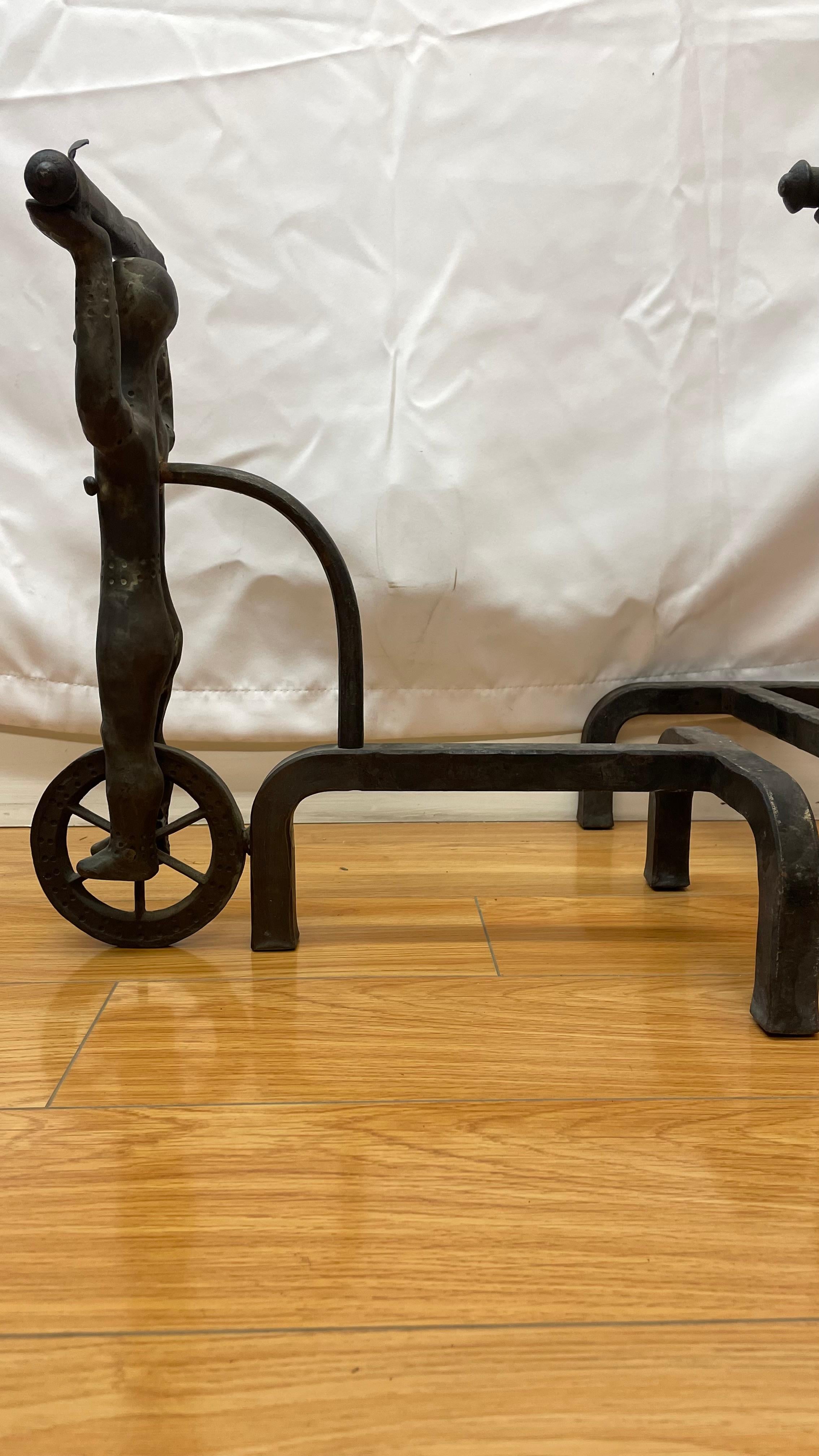 Mid-20th Century Rare Andirons With Acrobats on Wheels Circa 1940's For Sale
